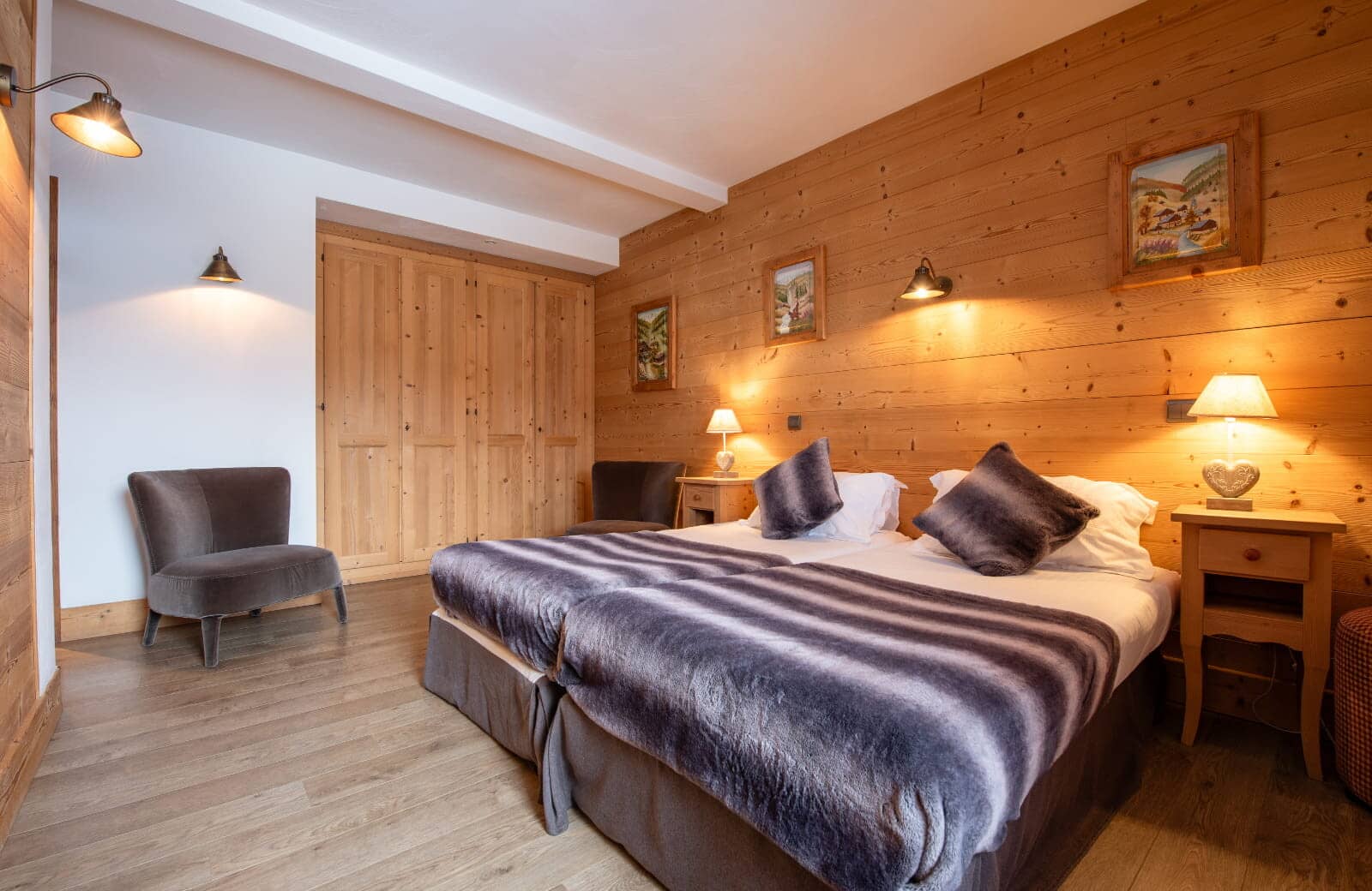 Bedroom with twin beds and large built-in wooden wardrobe