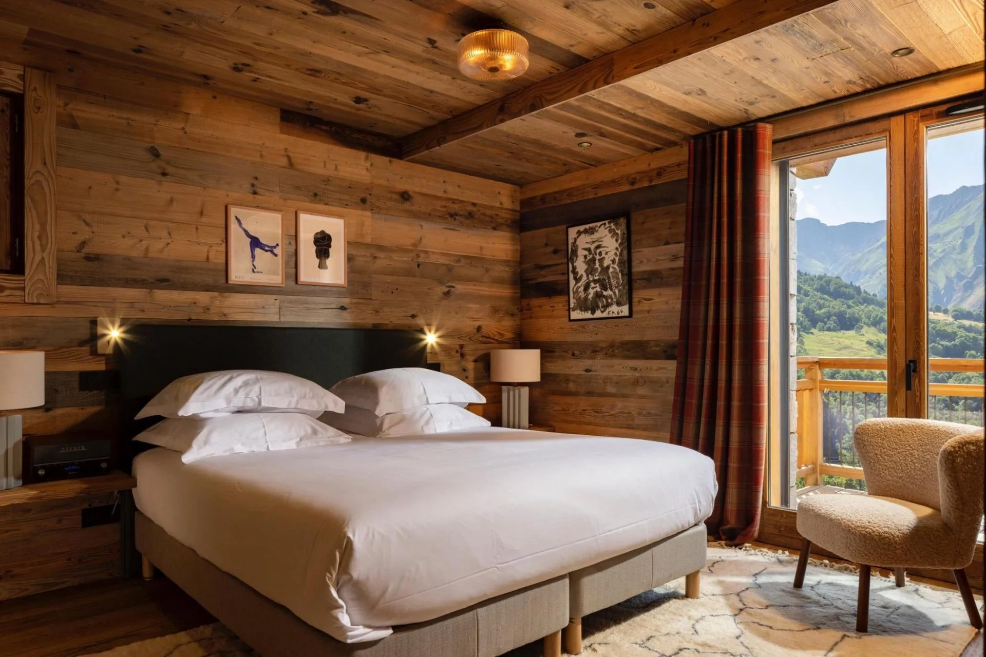 Double bedroom with balcony doors and mountain outlook