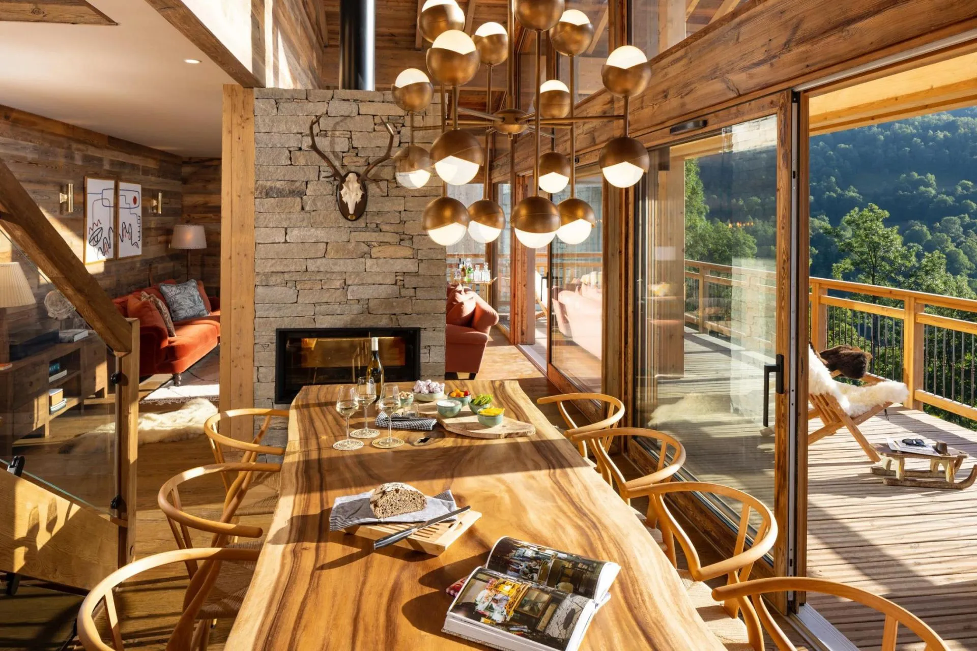 Dining table beside the fireplace and balcony doors