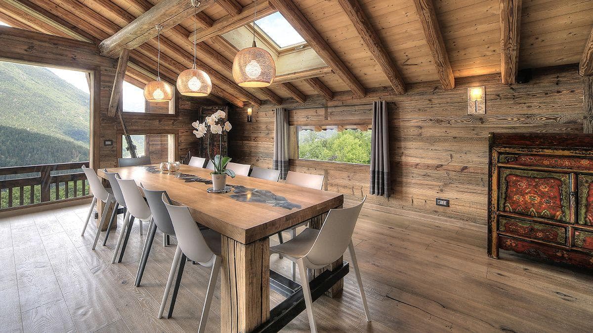 Dining area seats 10; mountain views and vaulted ceiling with skylight