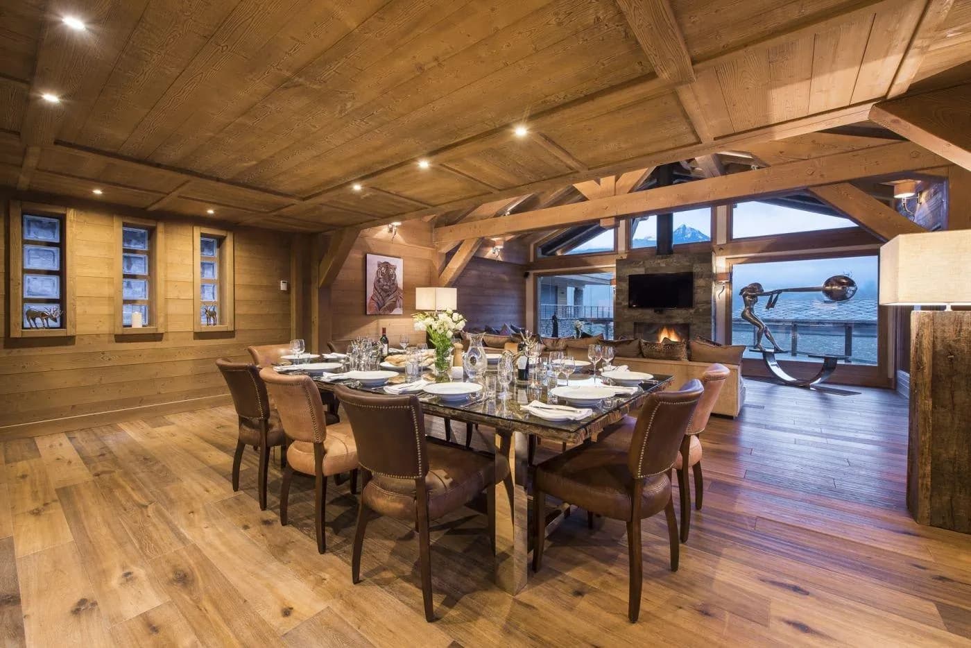 Dining area with seating for 10; adjacent to wood-burning fireplace