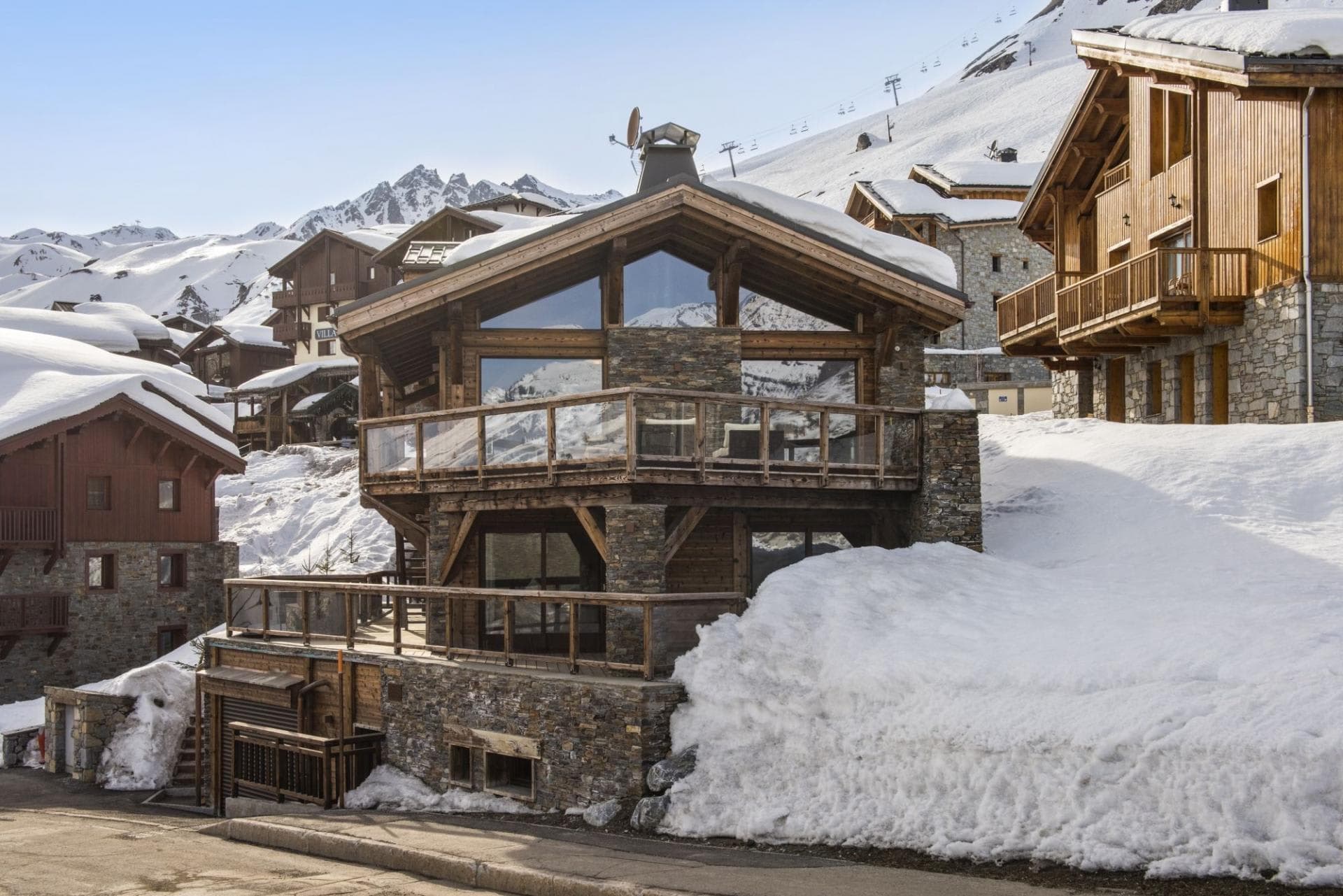 Ski-in/ski-out chalet with two-level wrap-around decks and mountain views