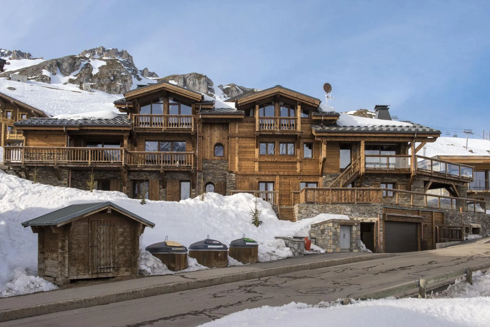 Ski-in/ski-out chalet with private garage and multiple mountain-facing balconies