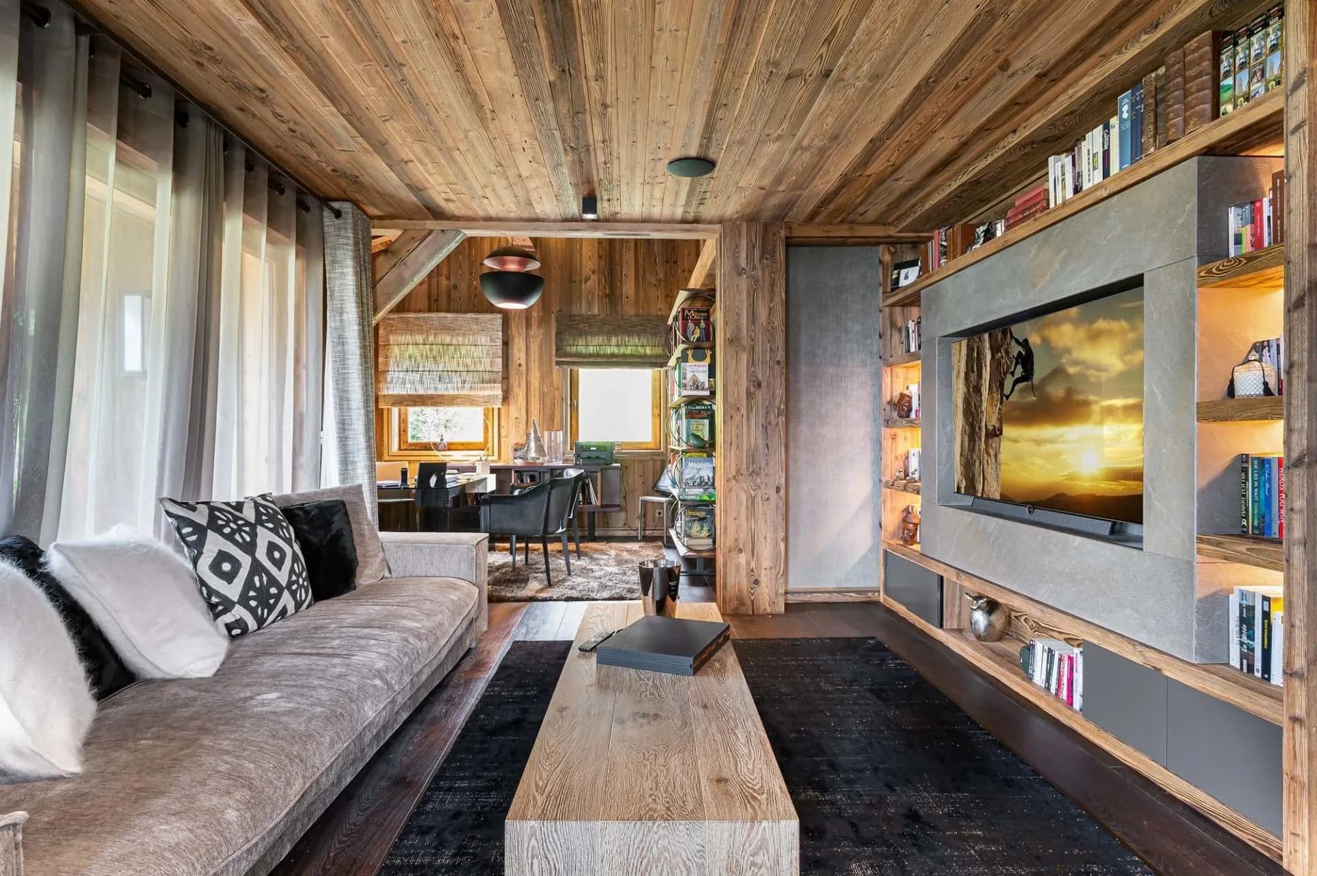 TV lounge with sofa seating and fireplace