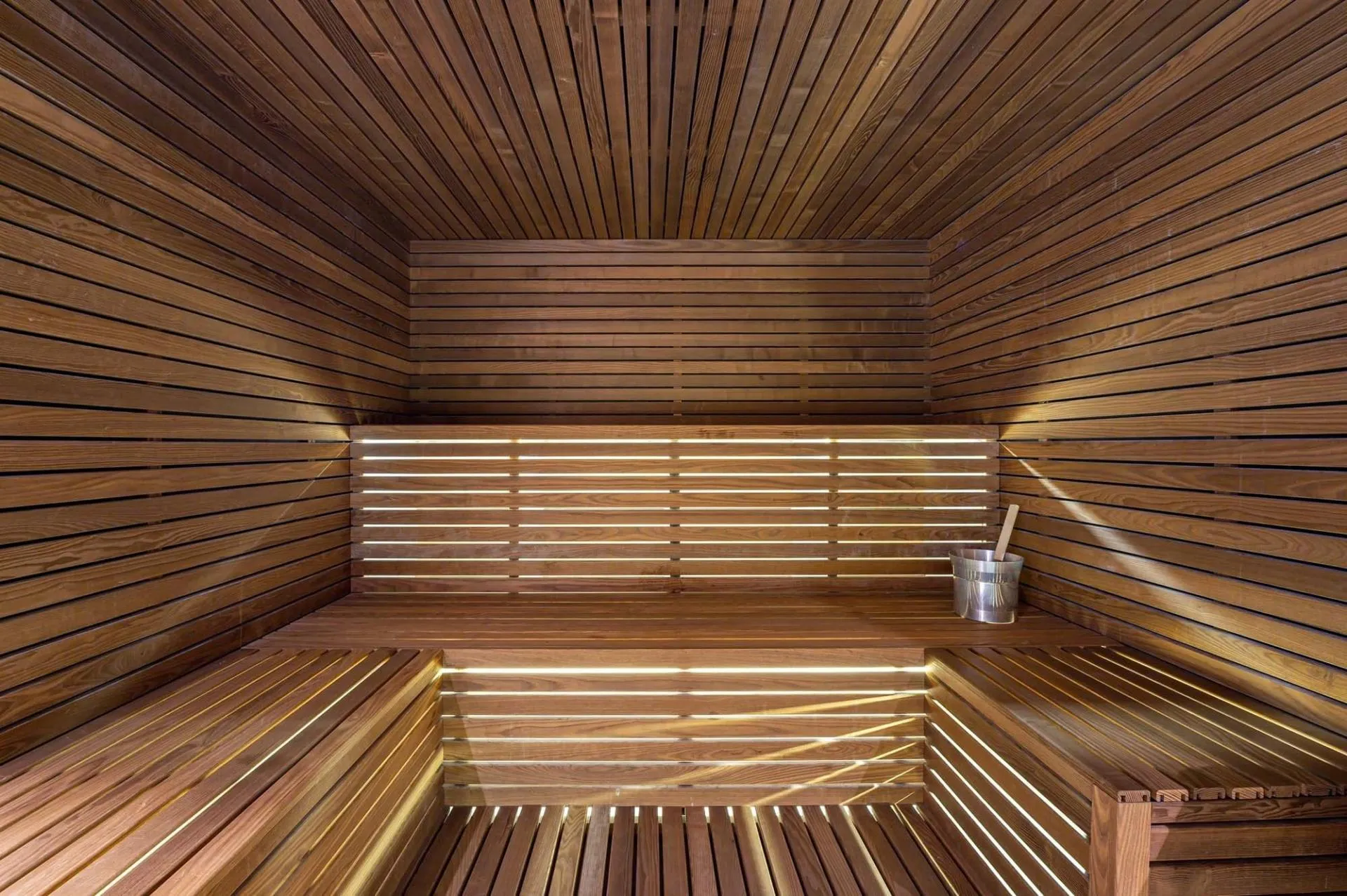Timber sauna with heated benches