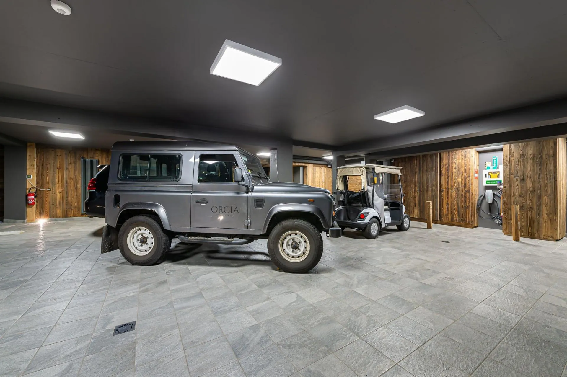Indoor garage with vehicles
