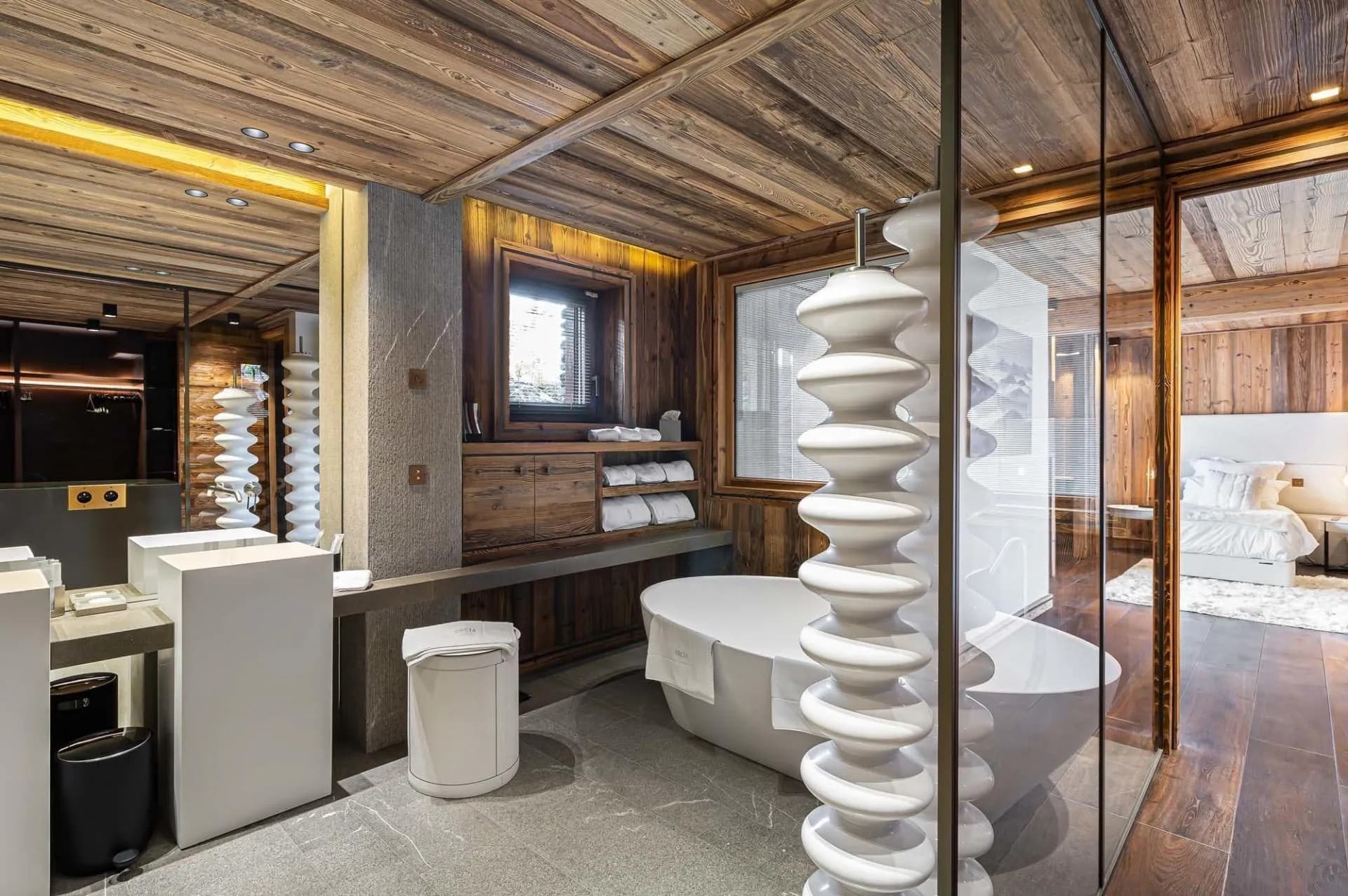 Bathroom with double basins and glazed walk-in shower