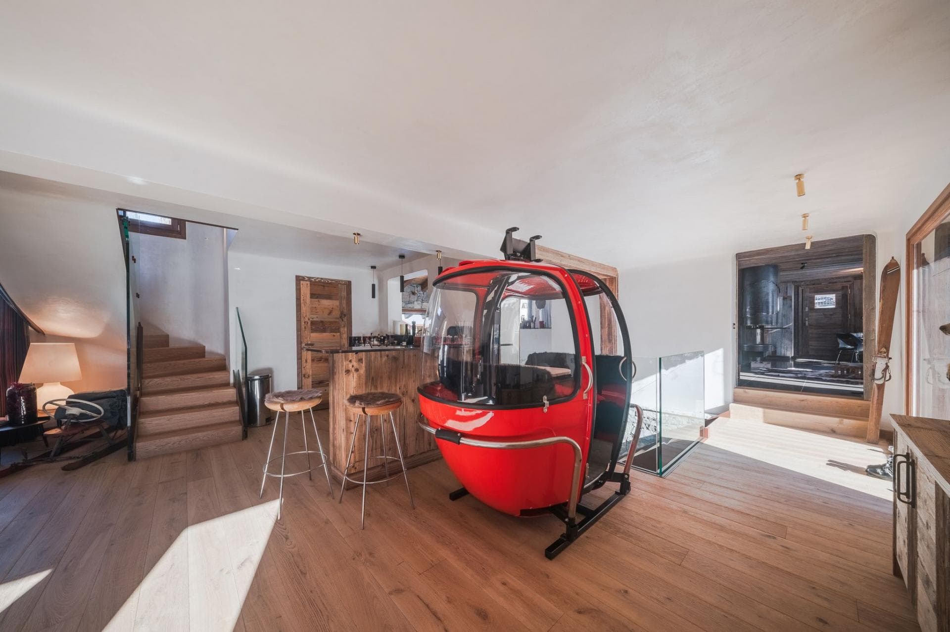 Lower level entry with breakfast bar and converted ski gondola seating
