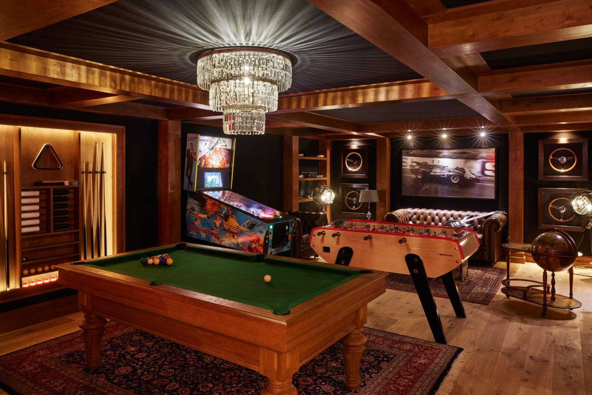 Game room featuring billiards, foosball, and 007-themed pinball machine