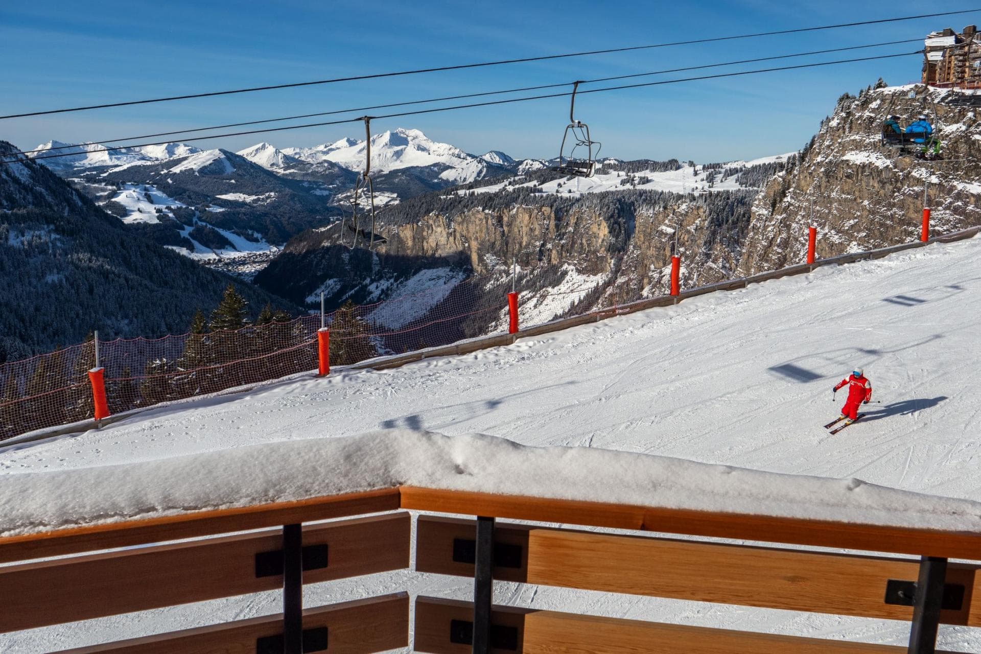 Ski-in, ski-out balcony view overlooking the piste and chairlift