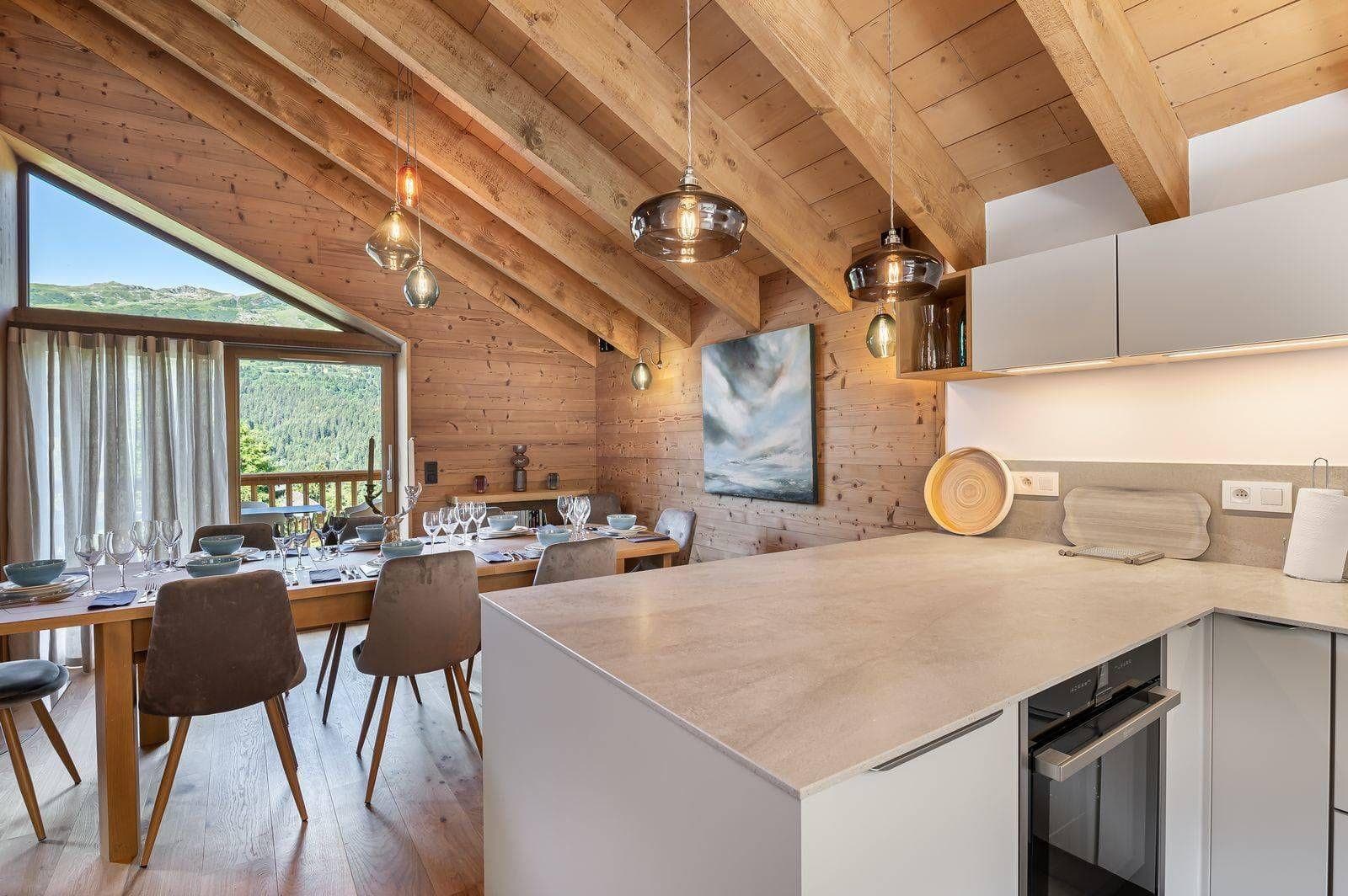 Dining area seats 8; vaulted wood ceilings and mountain views
