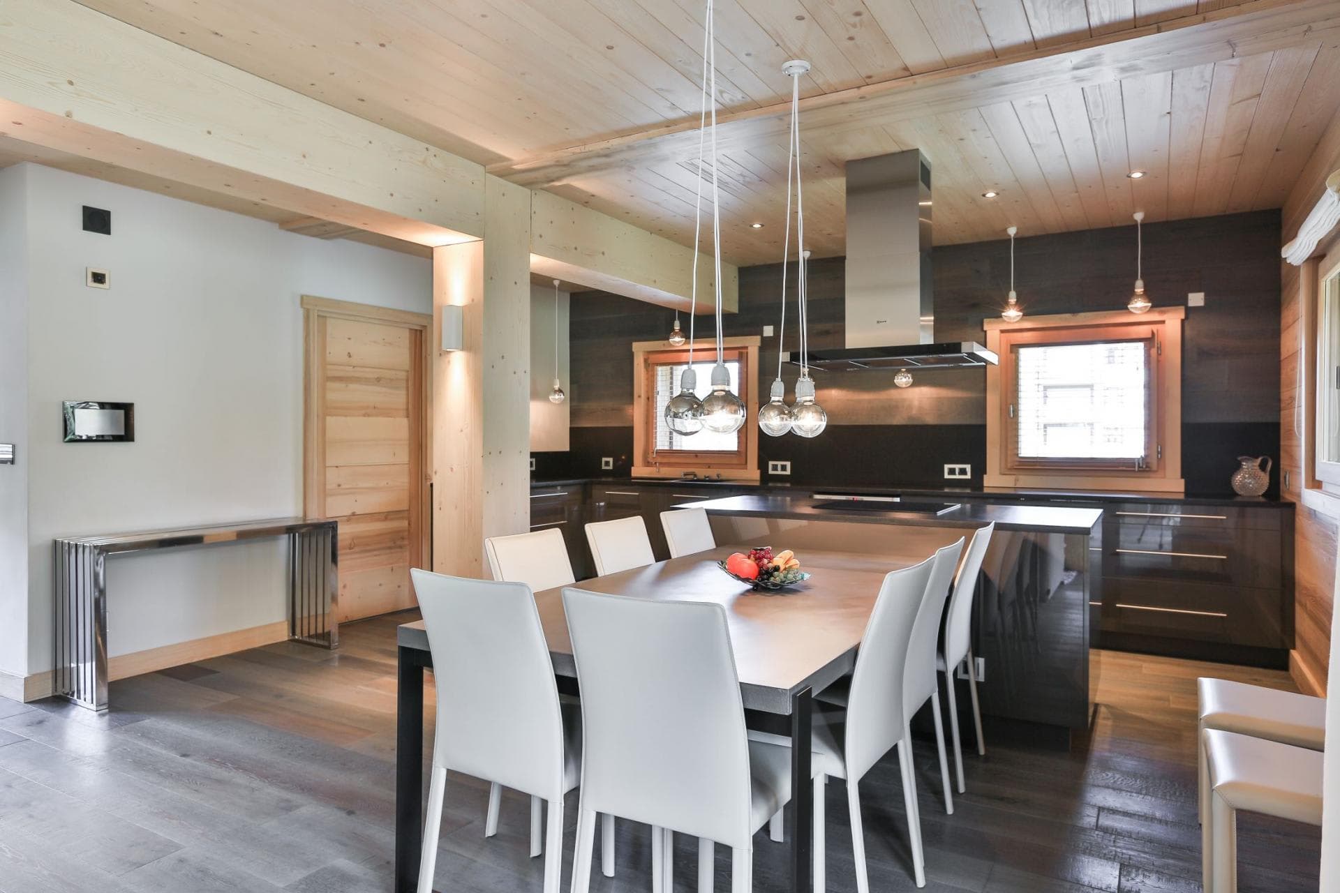 Open-plan kitchen and dining area with seating for 8