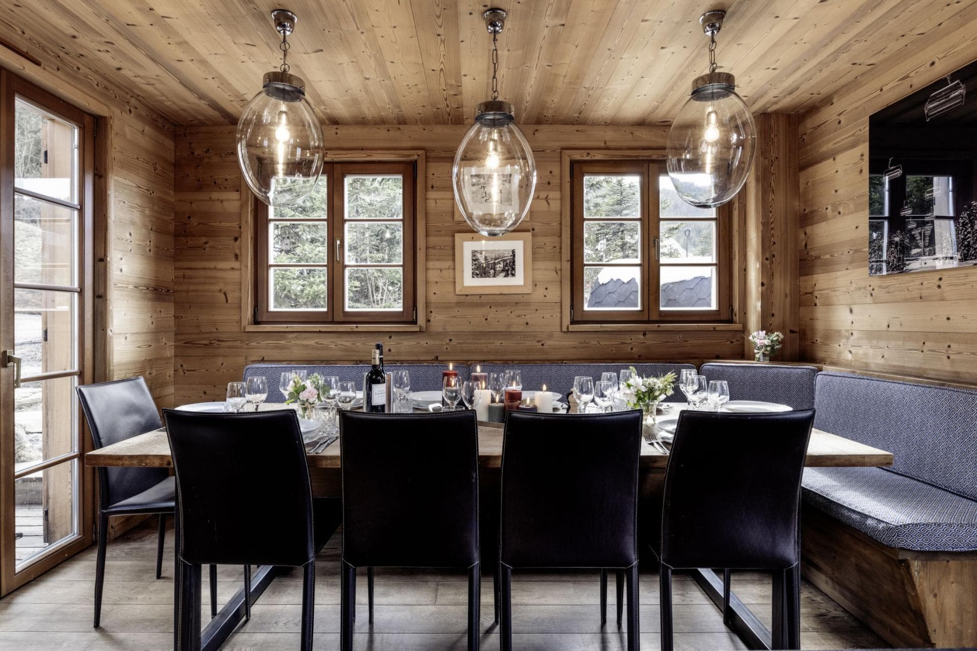 Dining area with booth seating and table for 10 guests