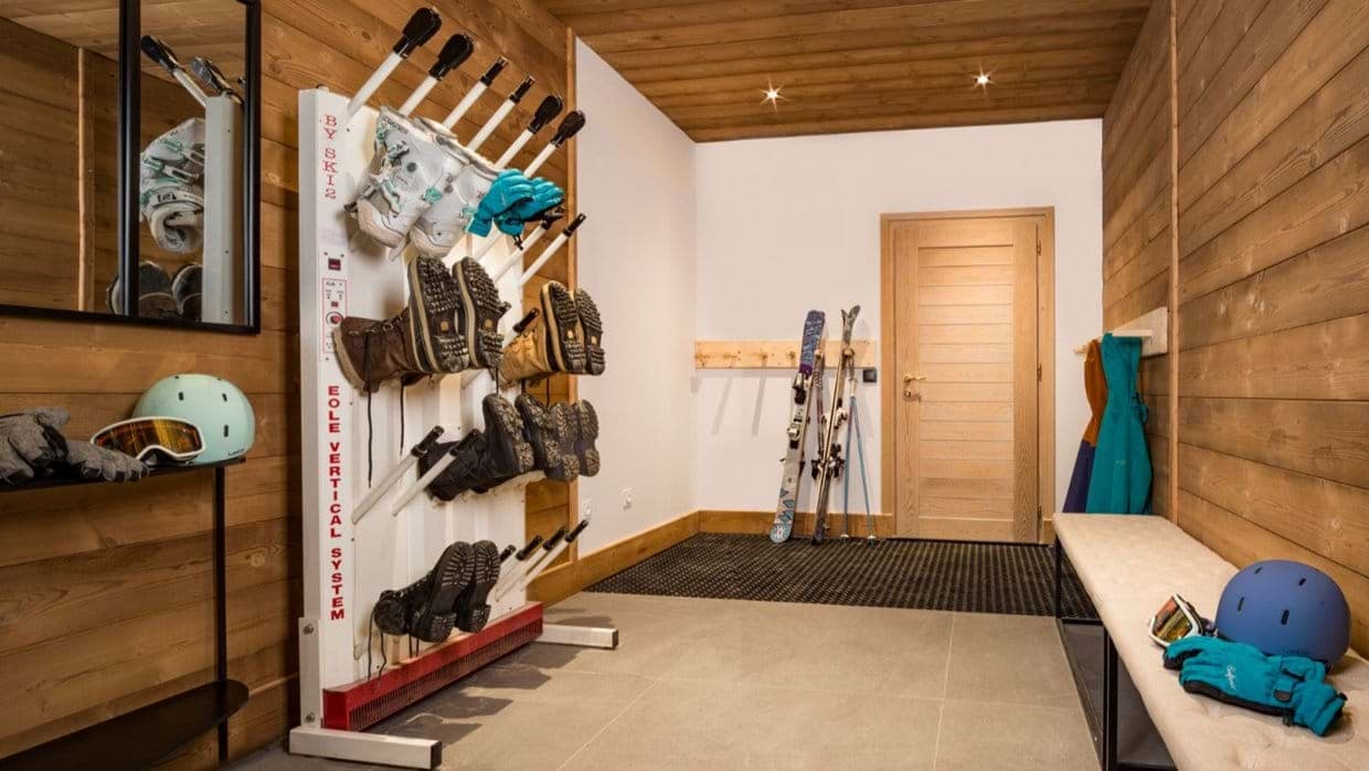 Mudroom with heated boot rack and ski storage