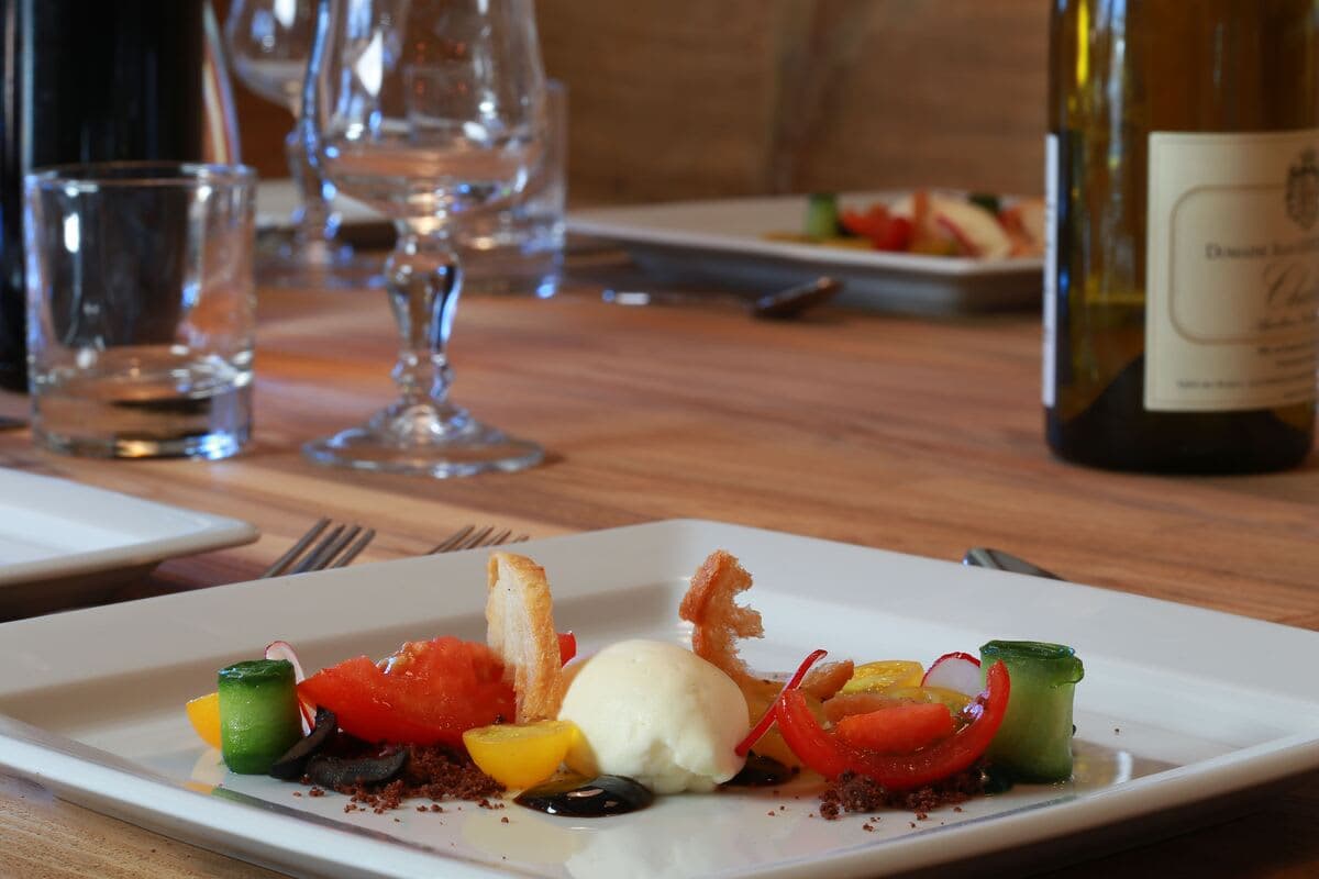 Solid wood dining table; private chef and catering services available for hire