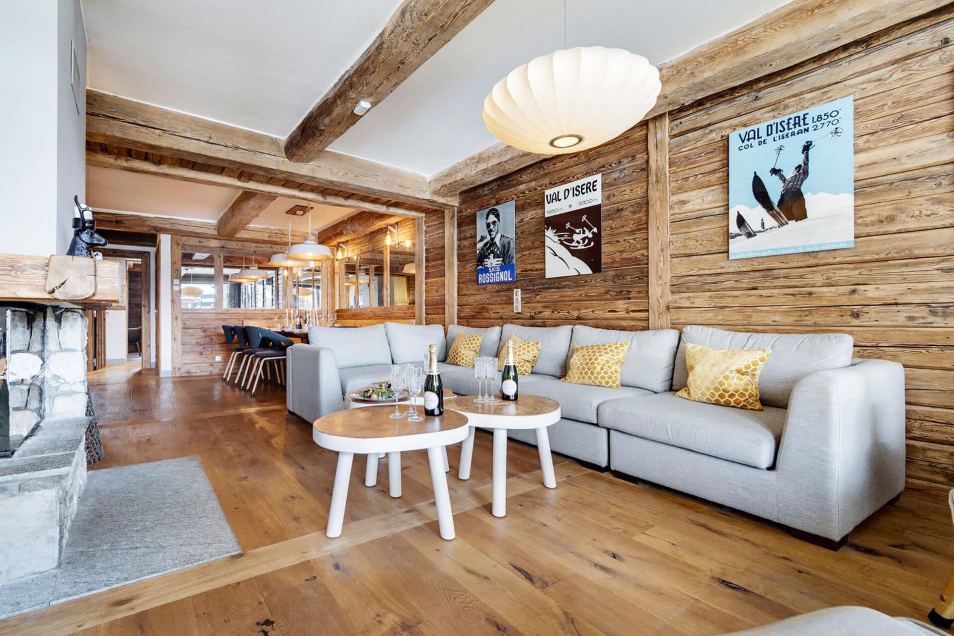 Living area with wood-burning fireplace and sectional seating for 8