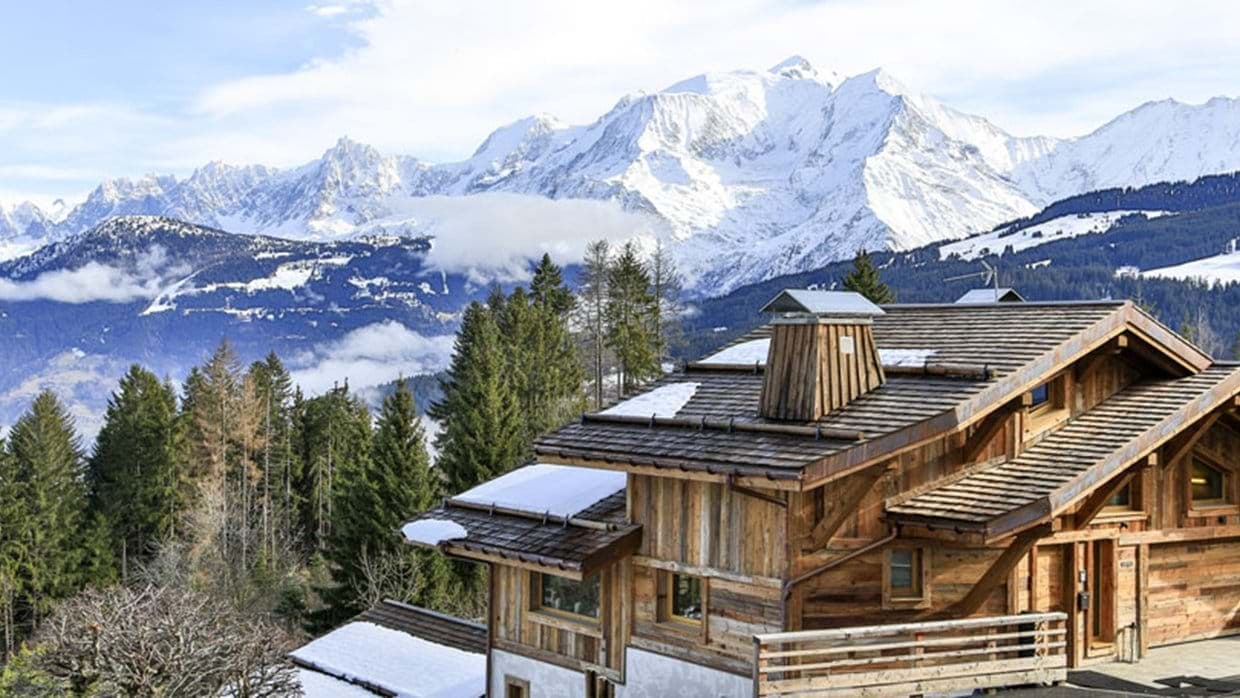 Chalet exterior with timber cladding and panoramic Mont Blanc mountain views