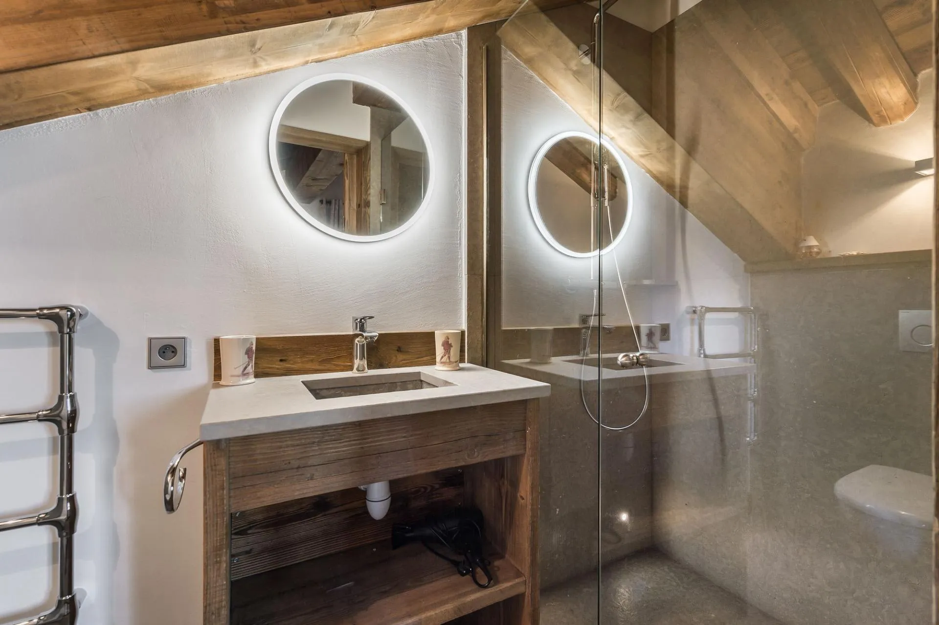 Shower room with a timber vanity and heated towel rail