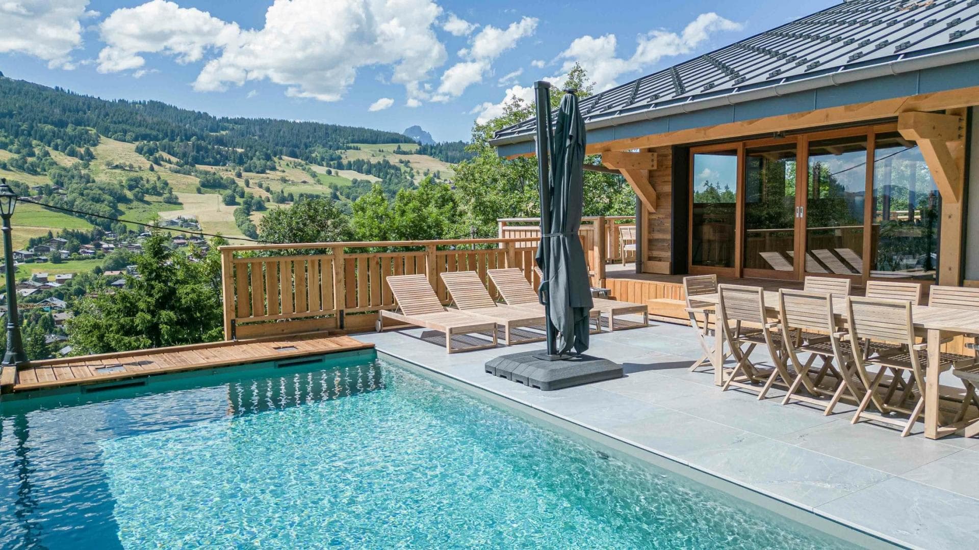 Pool terrace with dining for 8 and mountain valley views