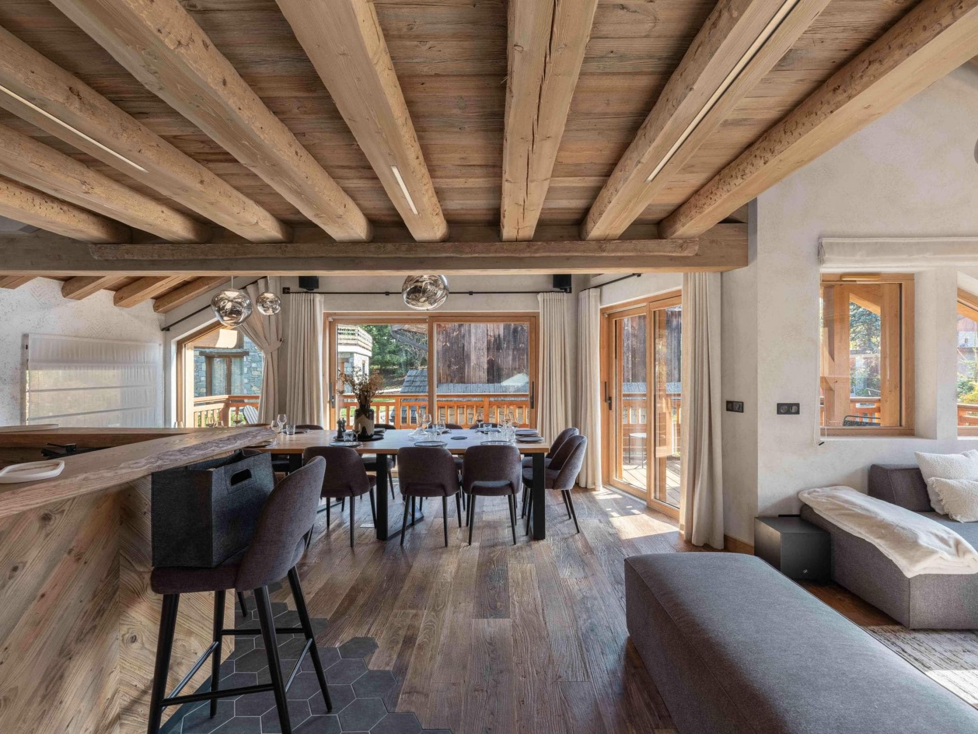 Open-plan dining area with terrace access and seating for 8