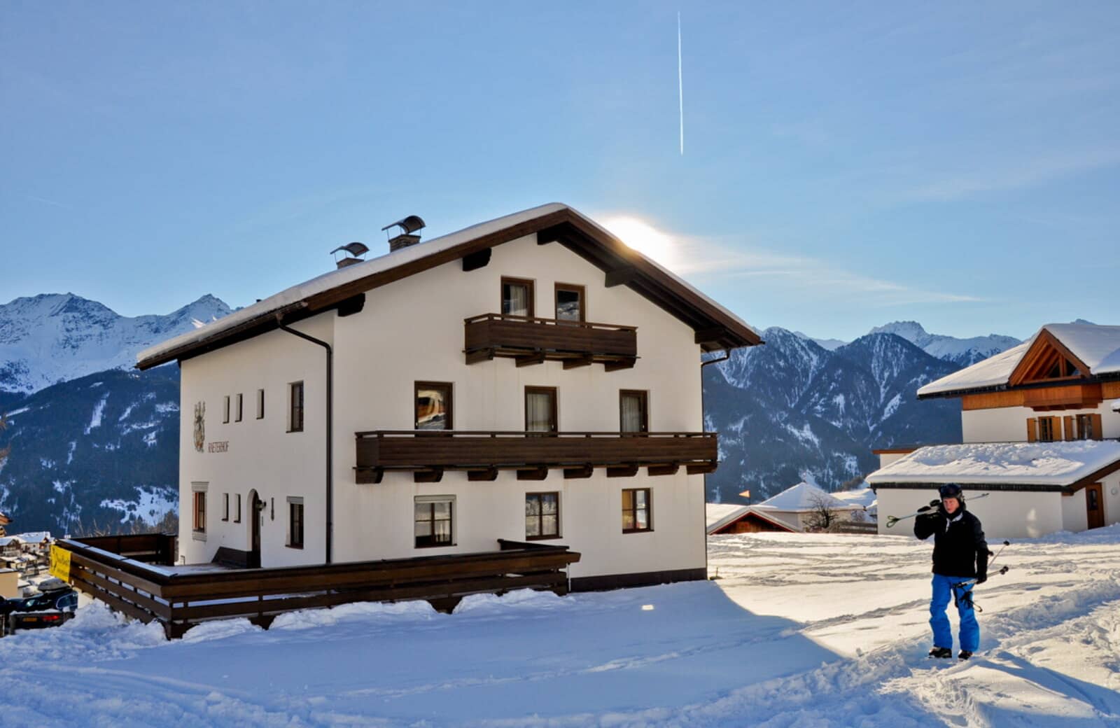 Chalet exterior with private balconies and direct access to ski slopes