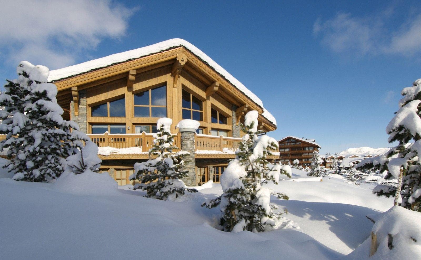 Ski-in, ski-out timber chalet with wrap-around sun deck