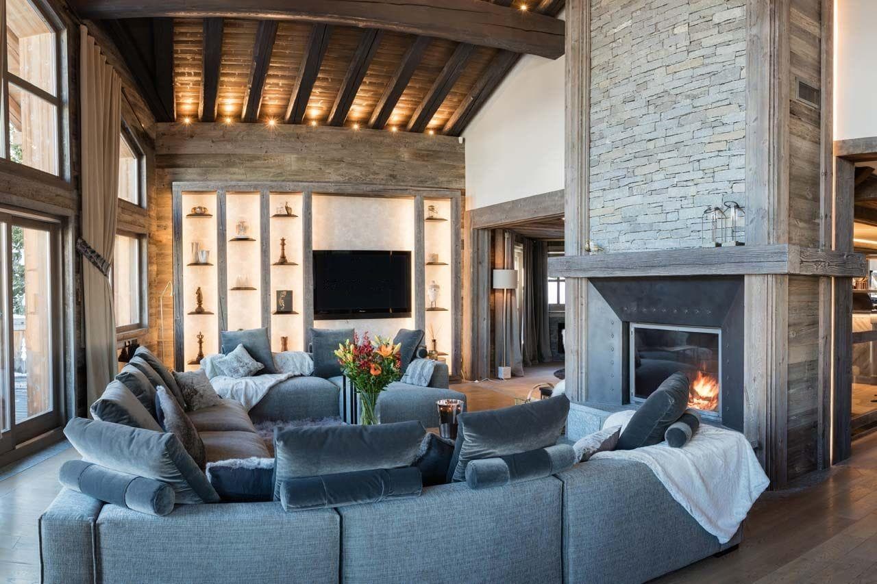 Living area with wood-burning fireplace and sectional seating for 10