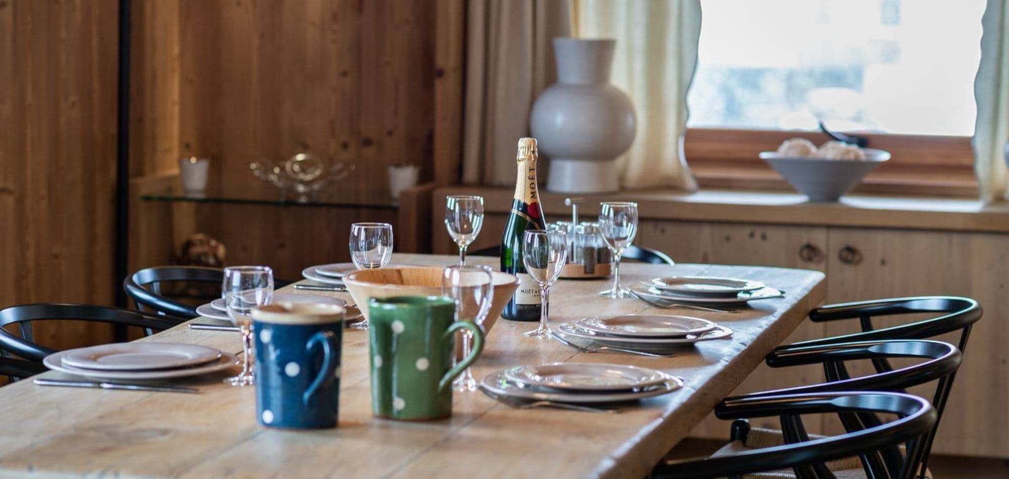 Dining area with seating for 8 and reclaimed wood table