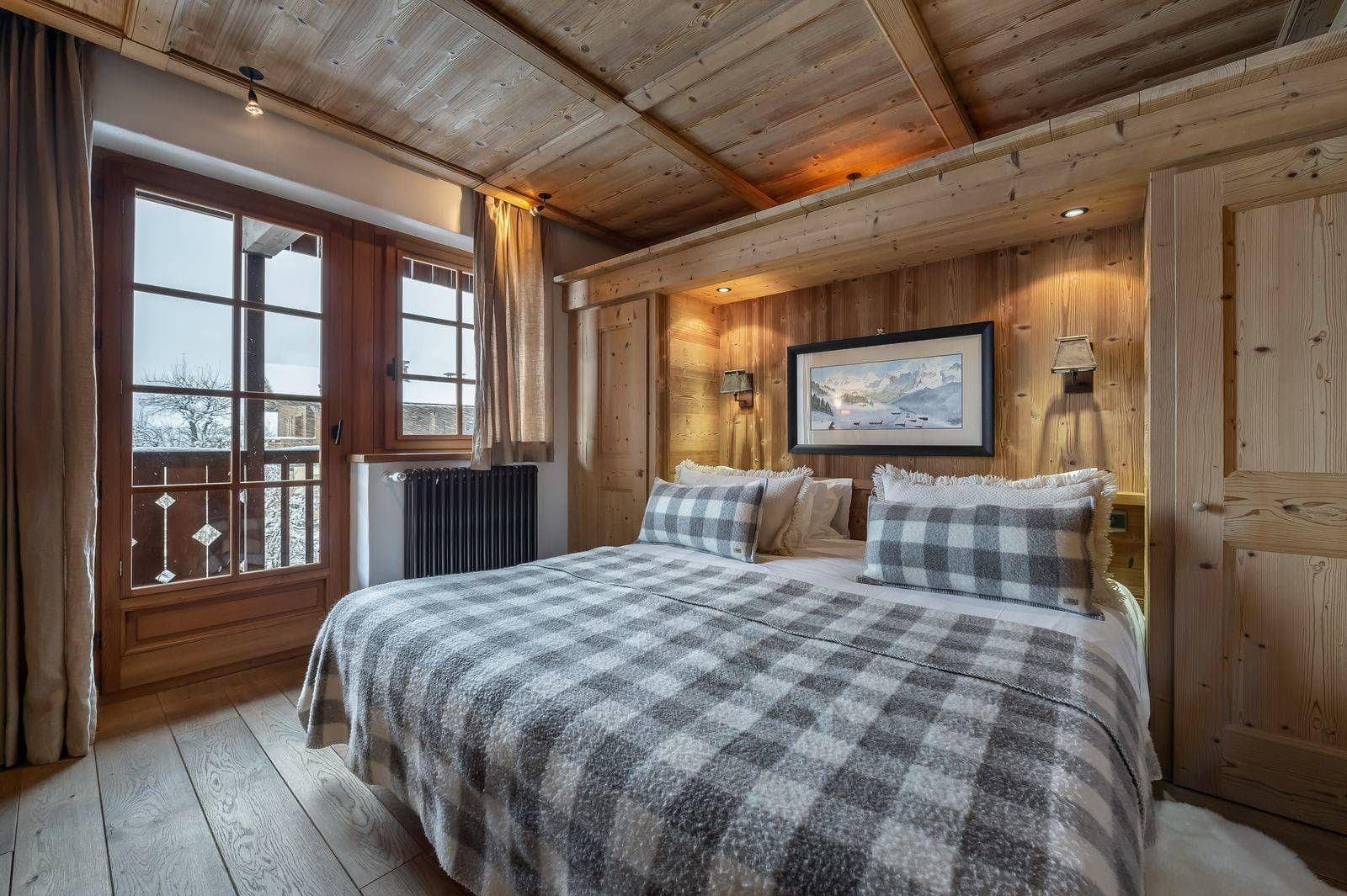 Double bedroom with timber walls