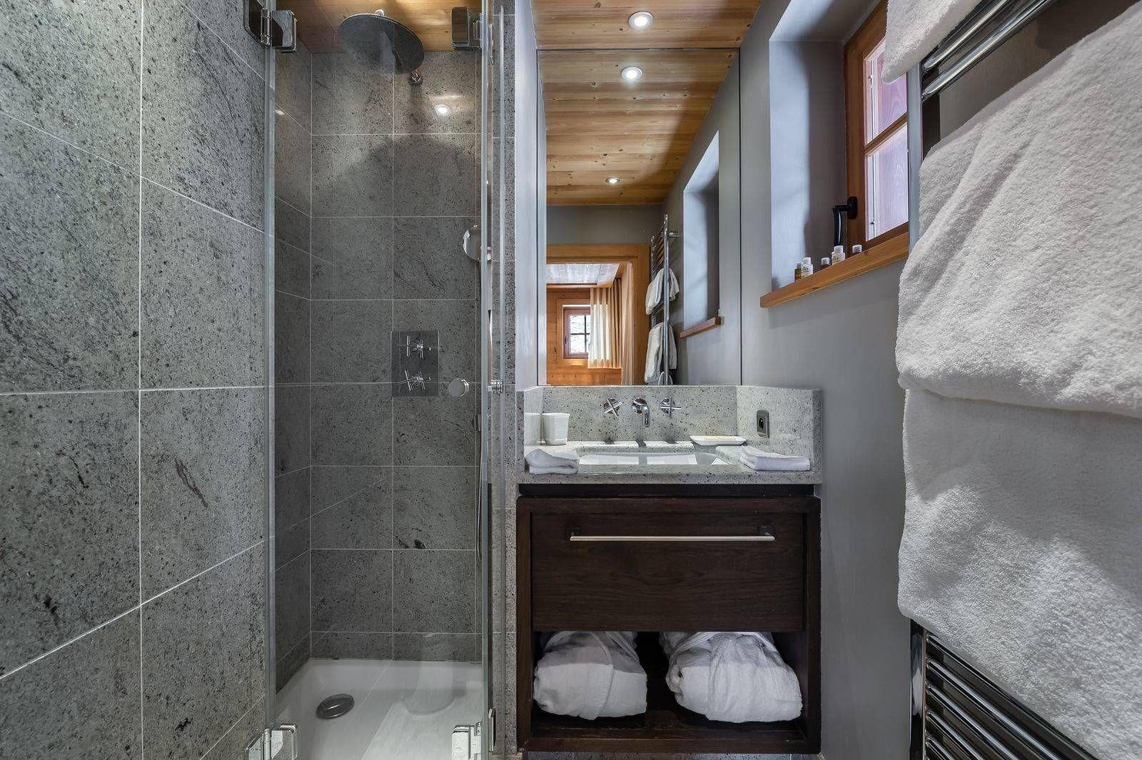 Shower room beside a bedroom