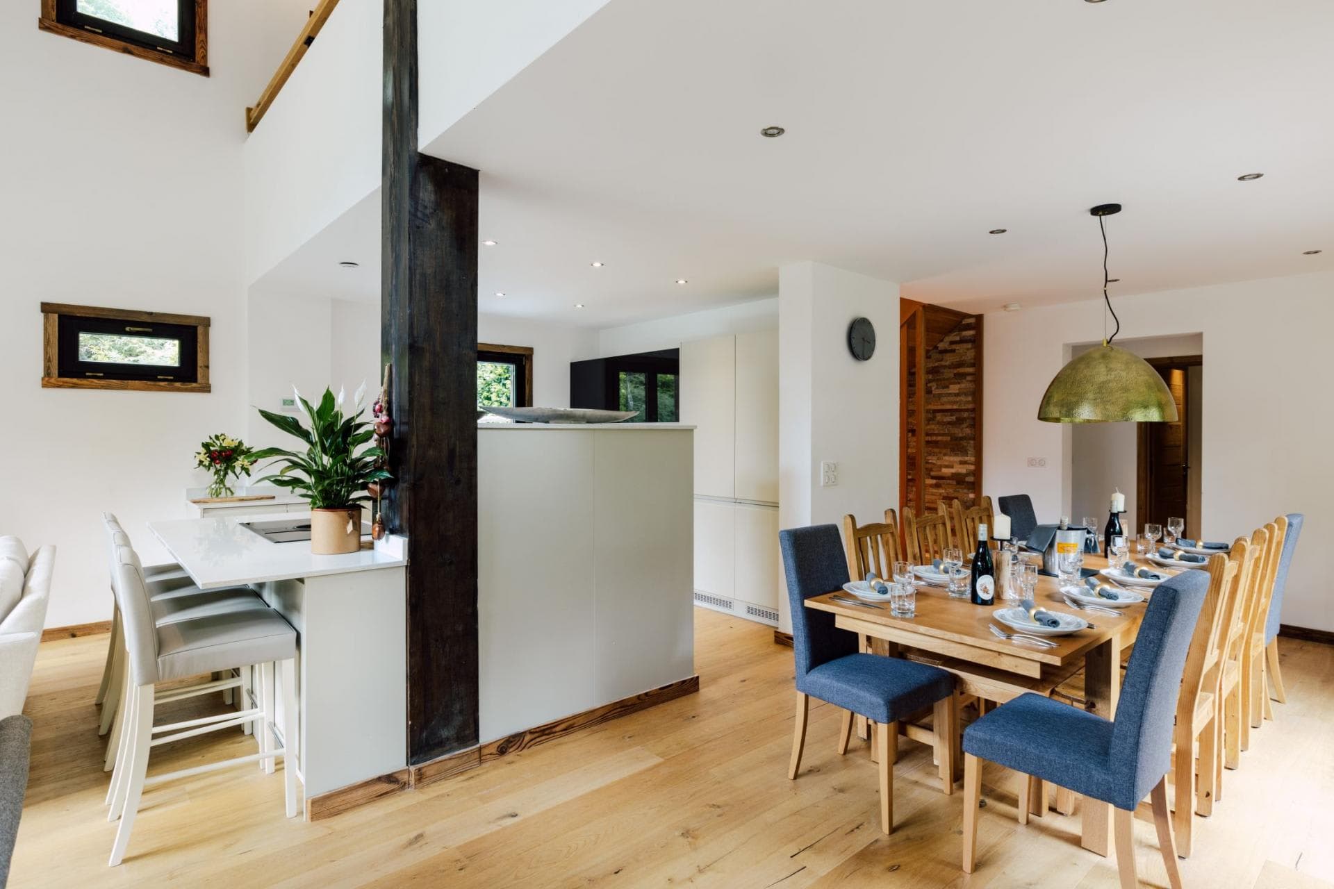 Open-plan dining area with seating for 10 and breakfast bar