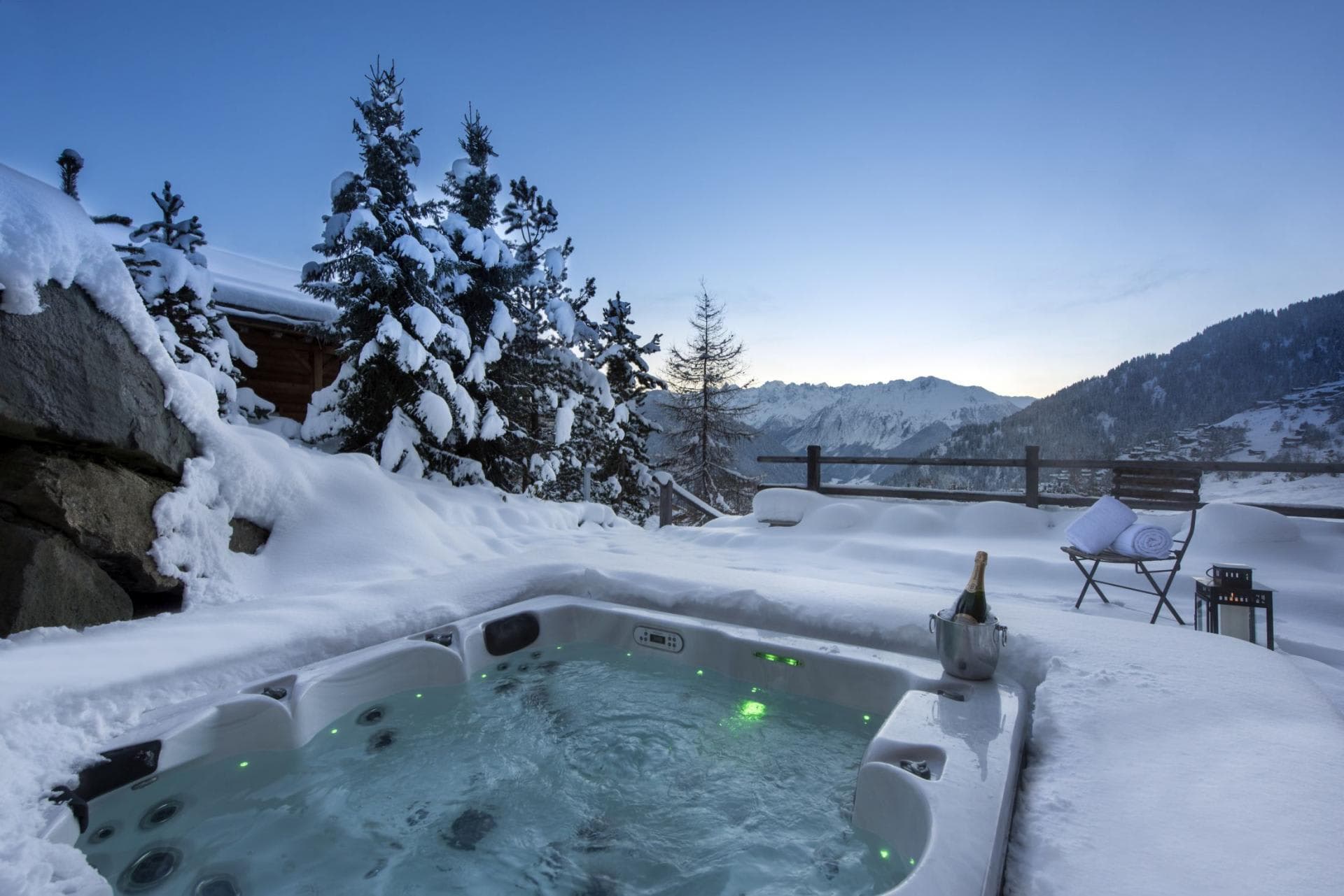 Outdoor hot tub seats 6 with panoramic Alpine valley views