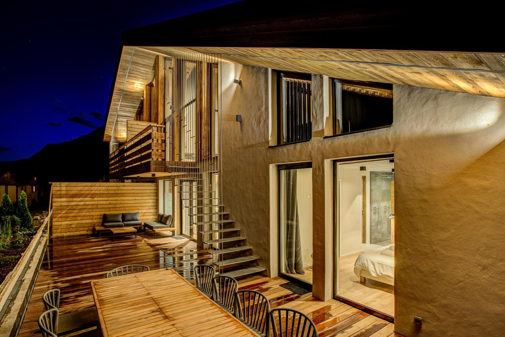 Bi-level terrace with dining for 8 and outdoor lounge seating