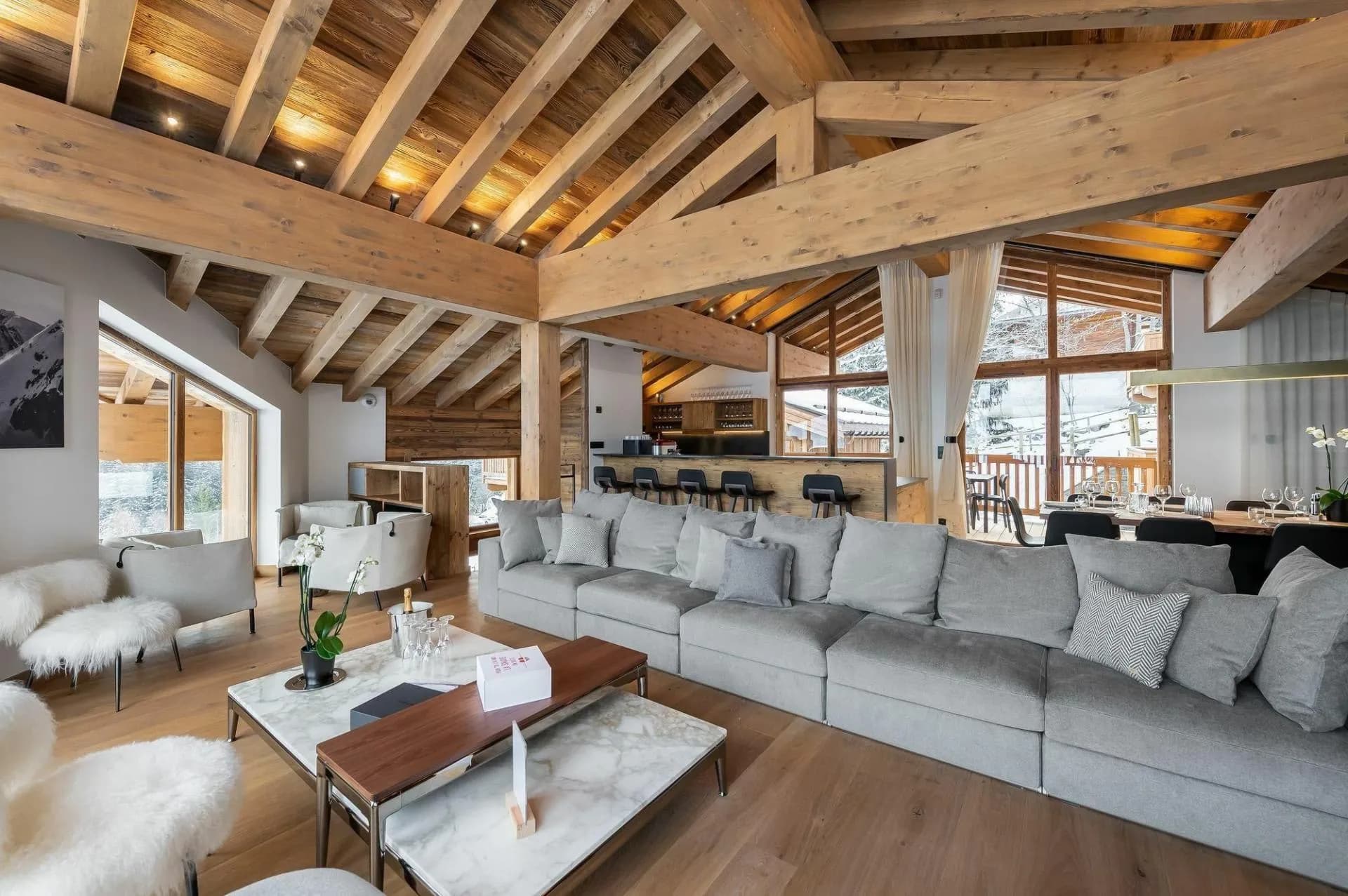 Living room with timber beams and fireplace