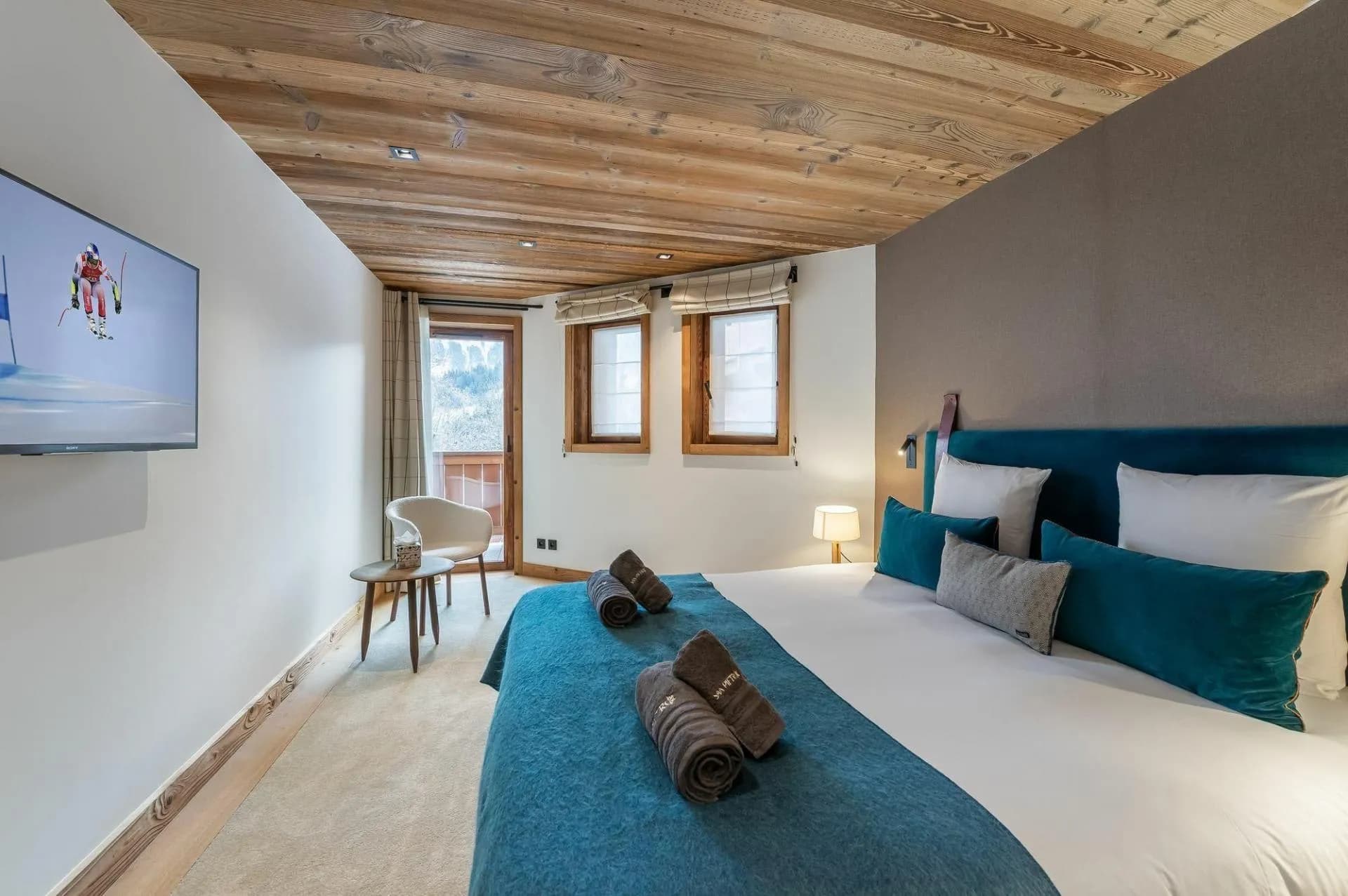 Double bedroom with balcony doors