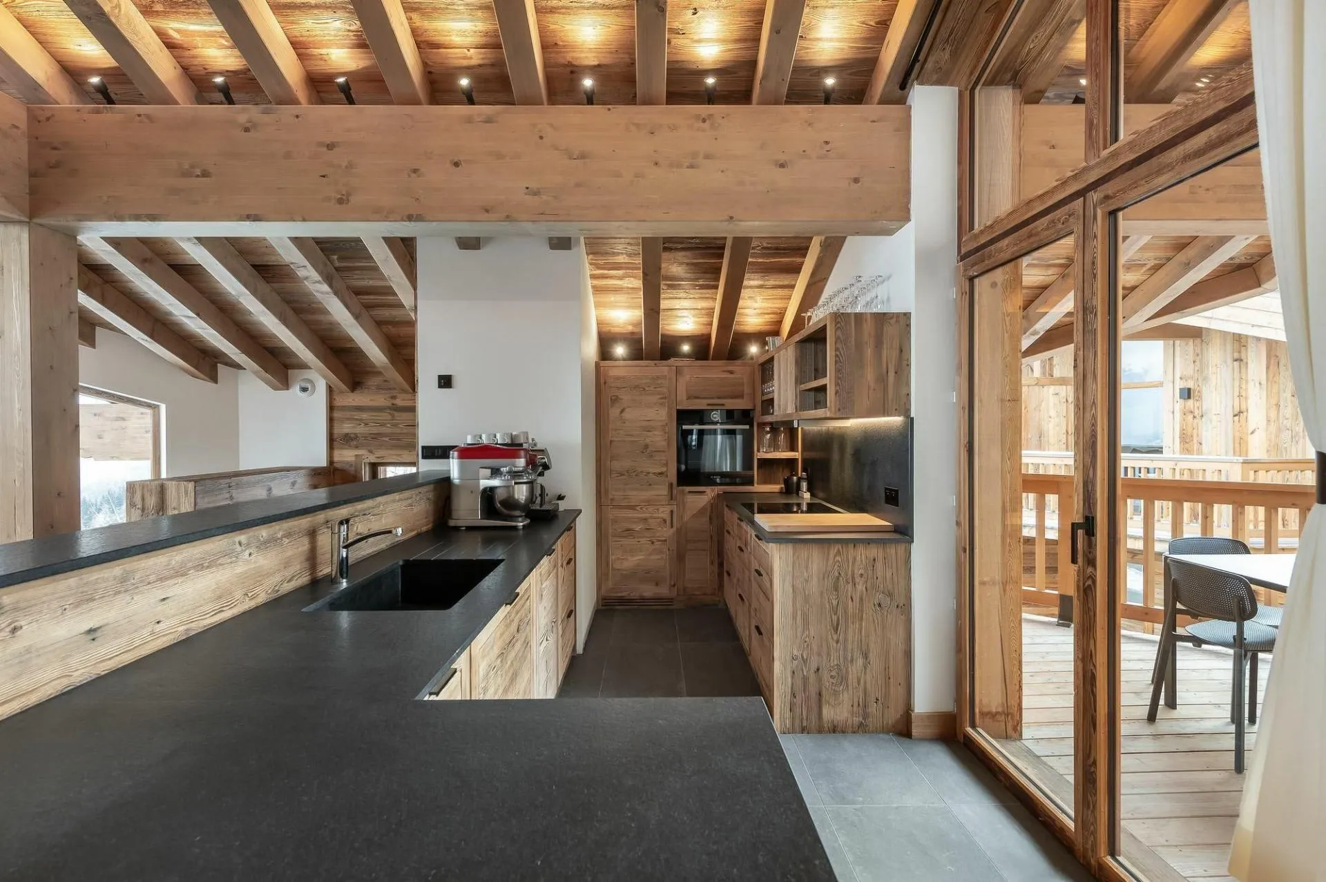 Open fitted kitchen with timber cabinetry