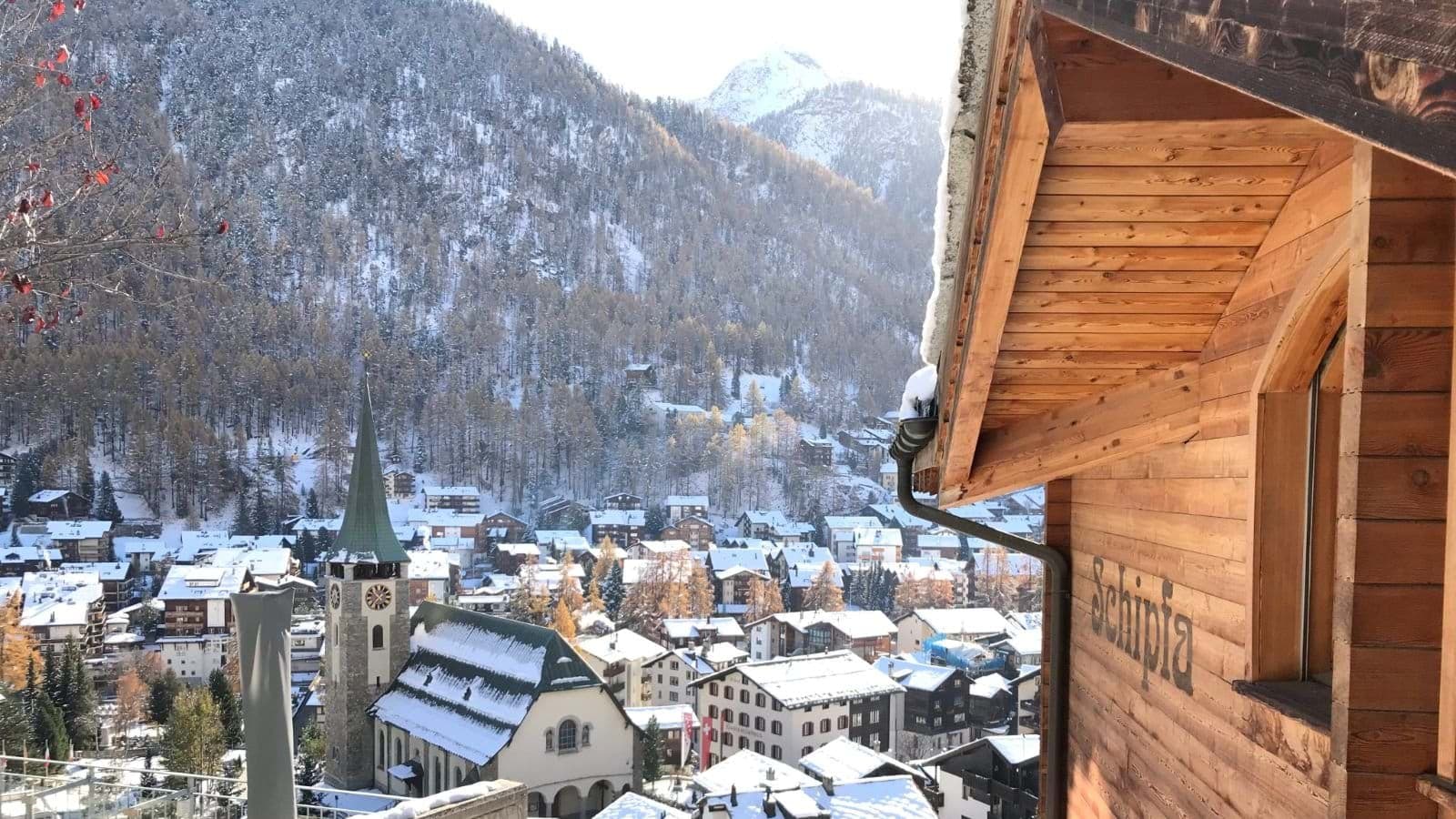 Private balcony view overlooking Zermatt village and St. Mauritius Church