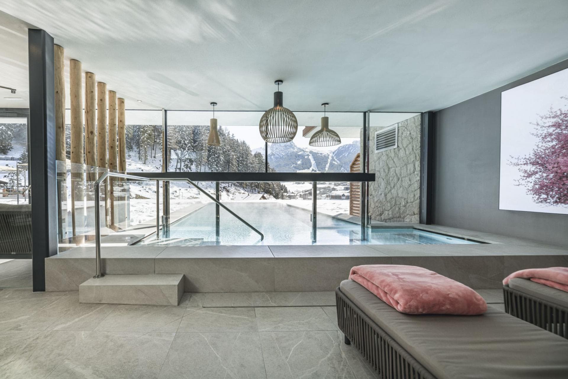Heated indoor-outdoor pool with panoramic mountain views