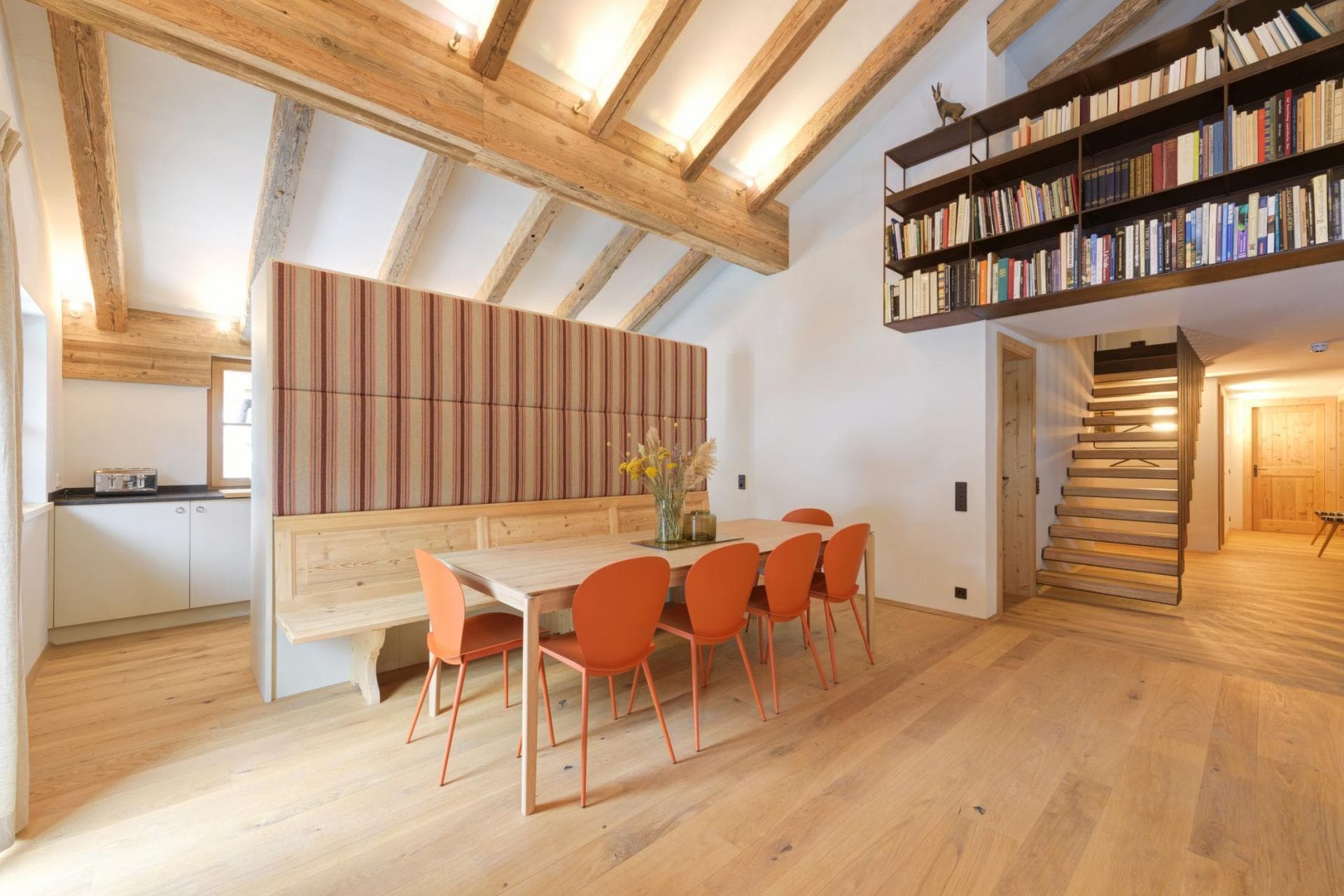 Dining area with seating for 10 and original timber-beamed ceilings