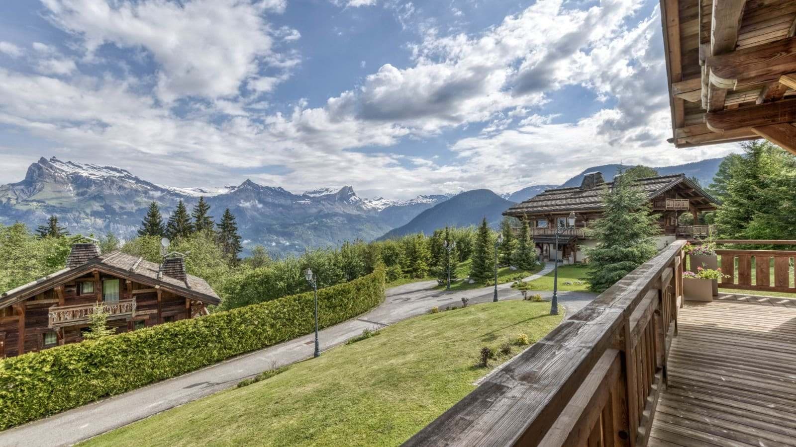 Private balcony with mountain views and adjacent chalet gardens
