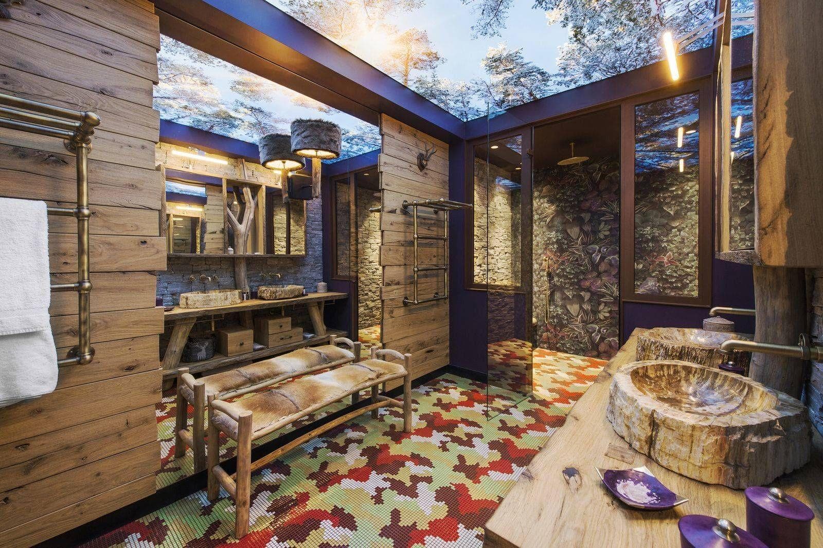 Bathroom with dual stone sinks and full-room glass skylight