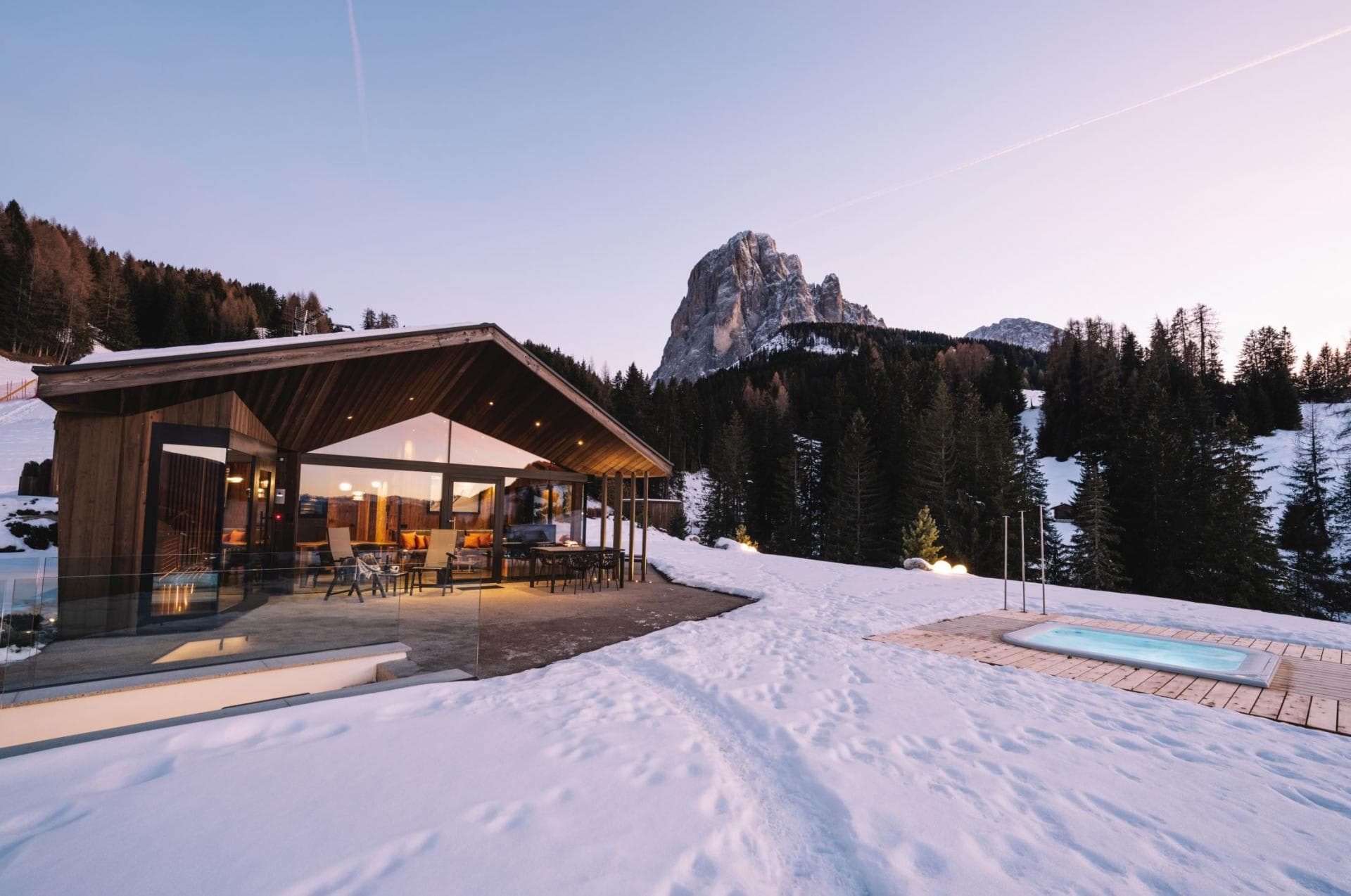 Ski-in/ski-out chalet with heated outdoor pool and Dolomites mountain views