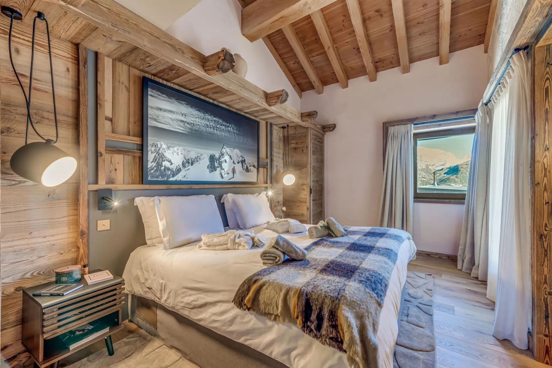 Bedroom with king bed and mountain views