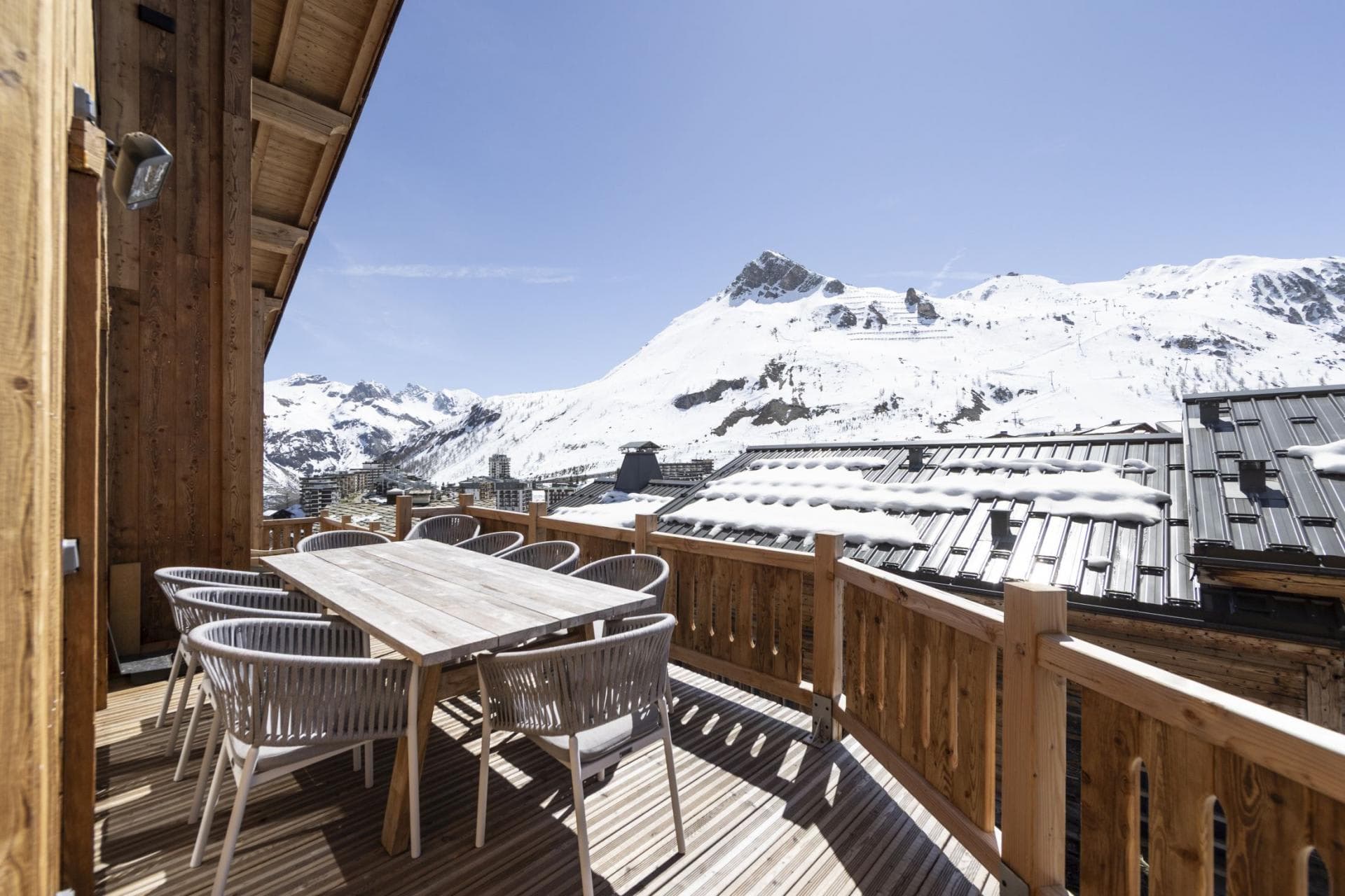 Balcony with dining table for 8 and alpine views