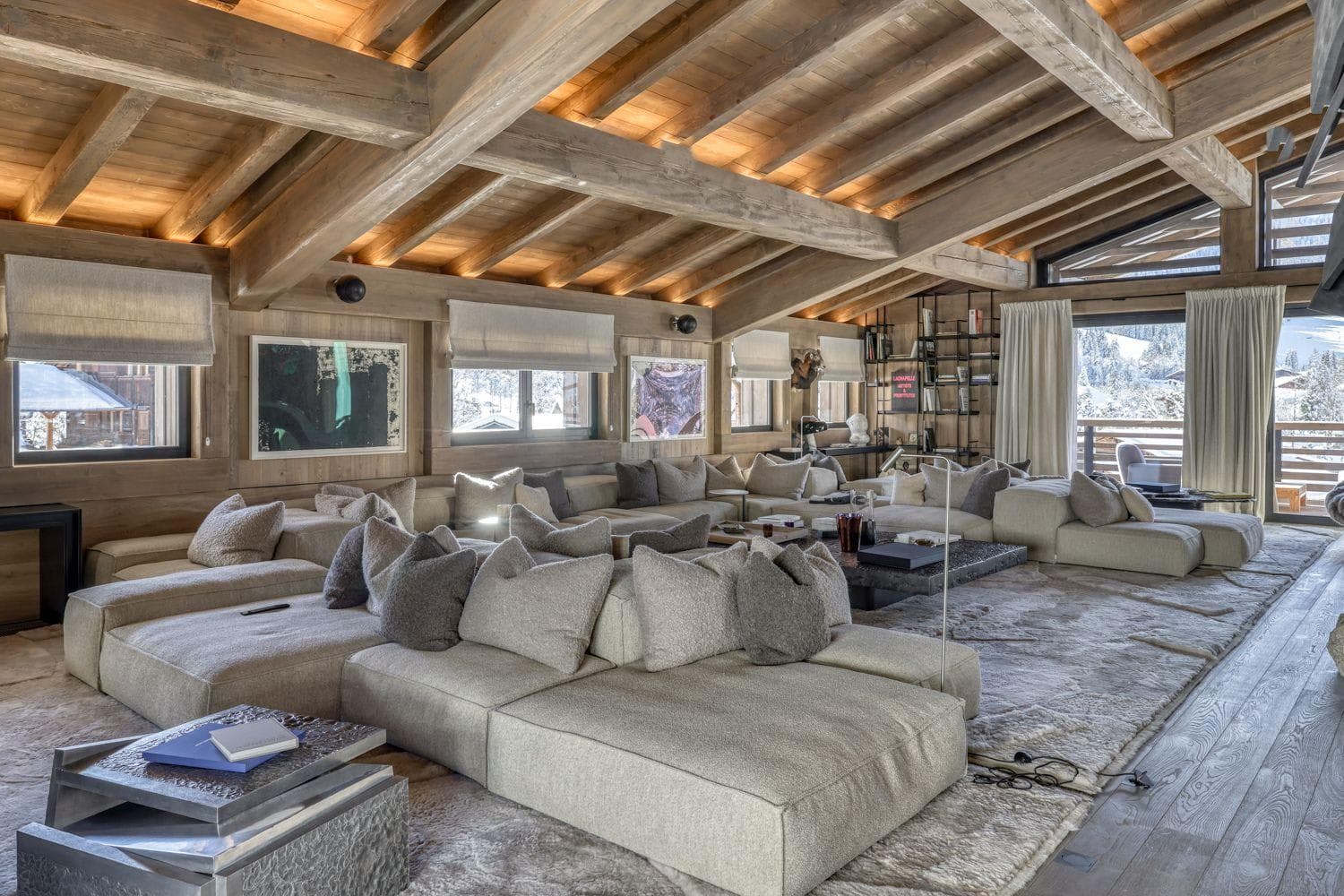 Living area with modular sectional seating for 12 and vaulted timber ceilings