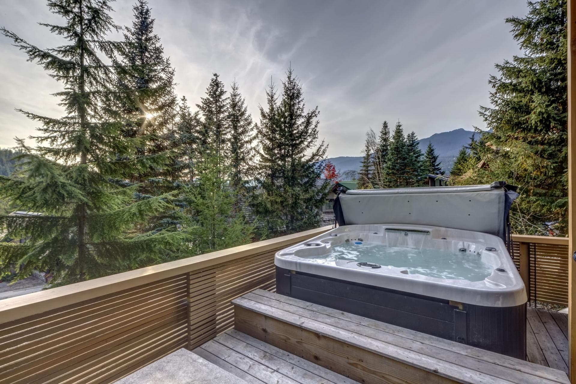 Private deck with hot tub and mountain views