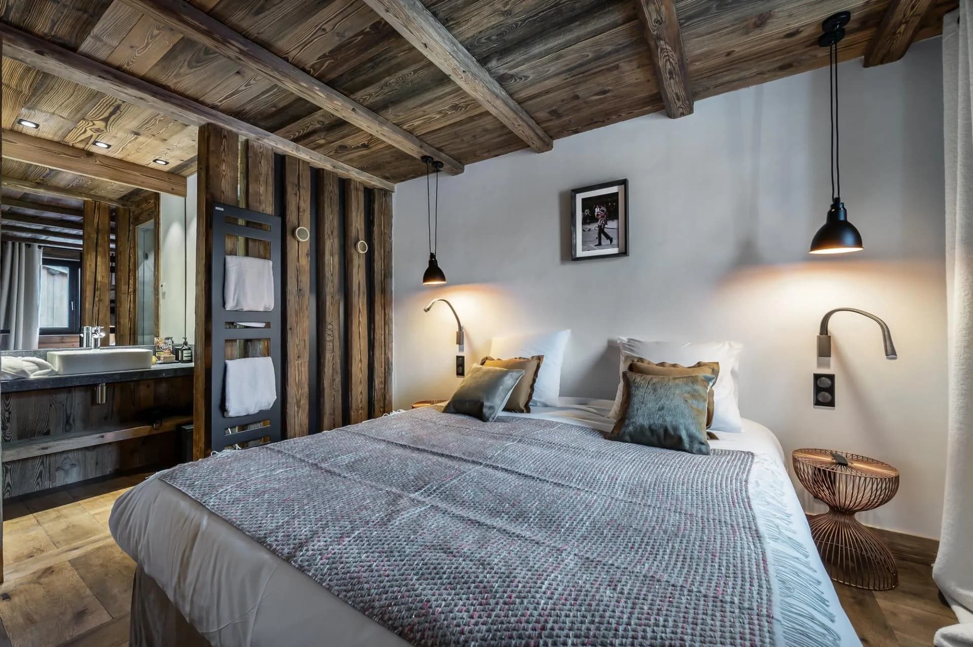 Double bedroom with windows and timber walls