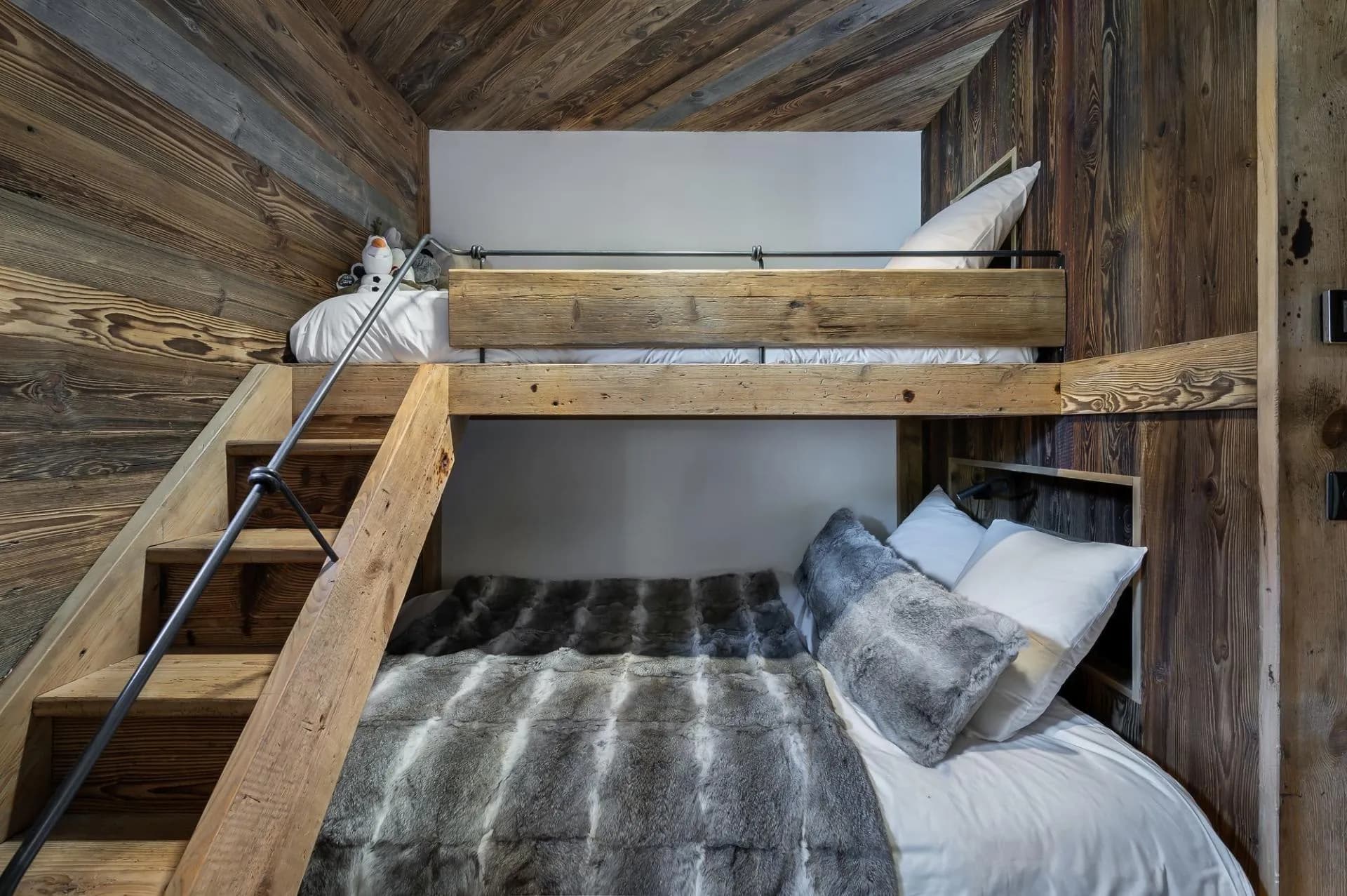 Children’s room with double bed and single upper bunk