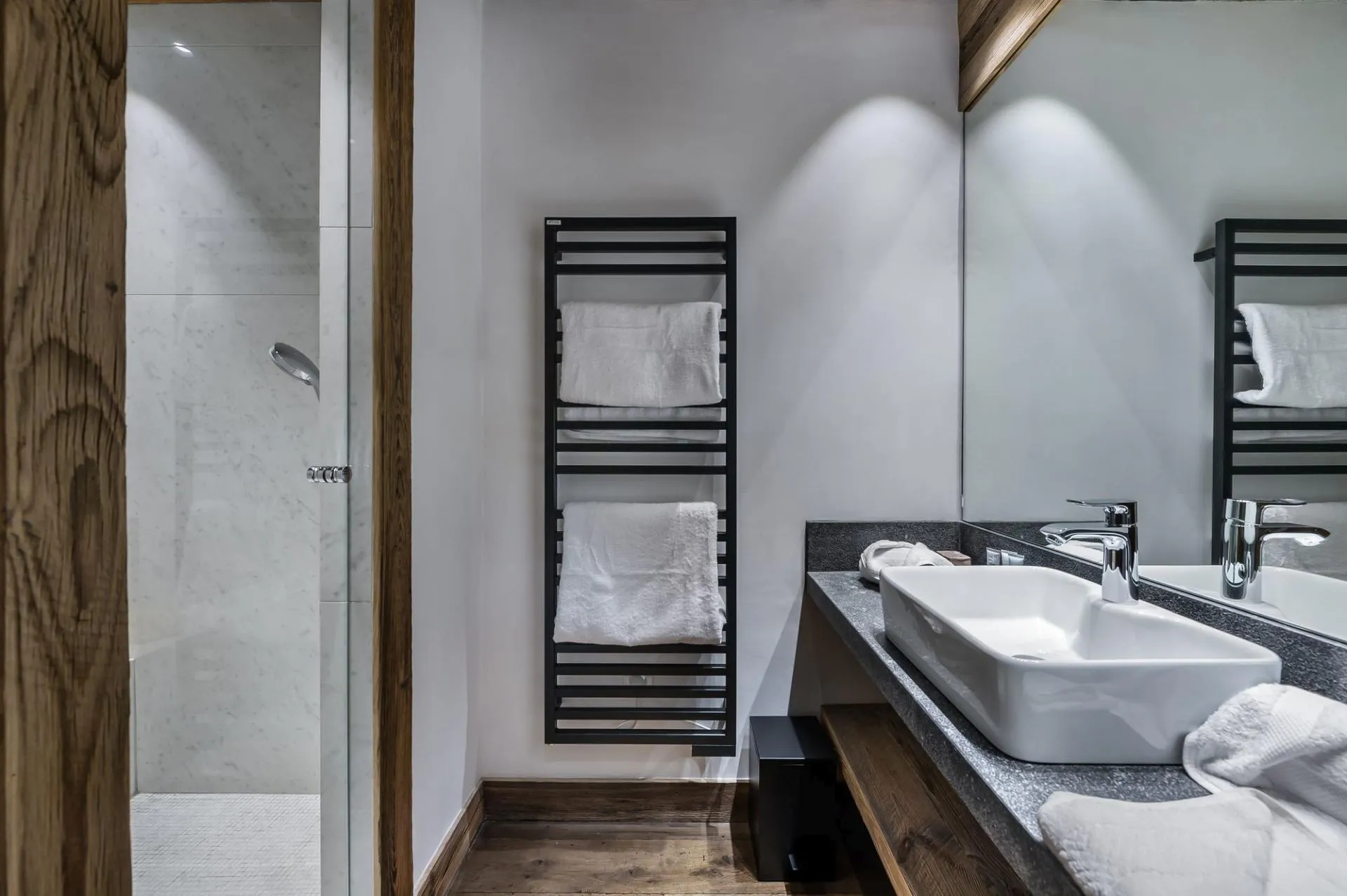 Bathroom with basin vanity and towel warmer