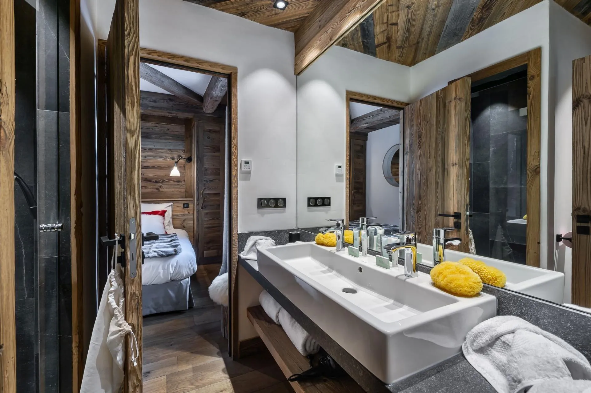 Bathroom with basin and mirrored timber detailing